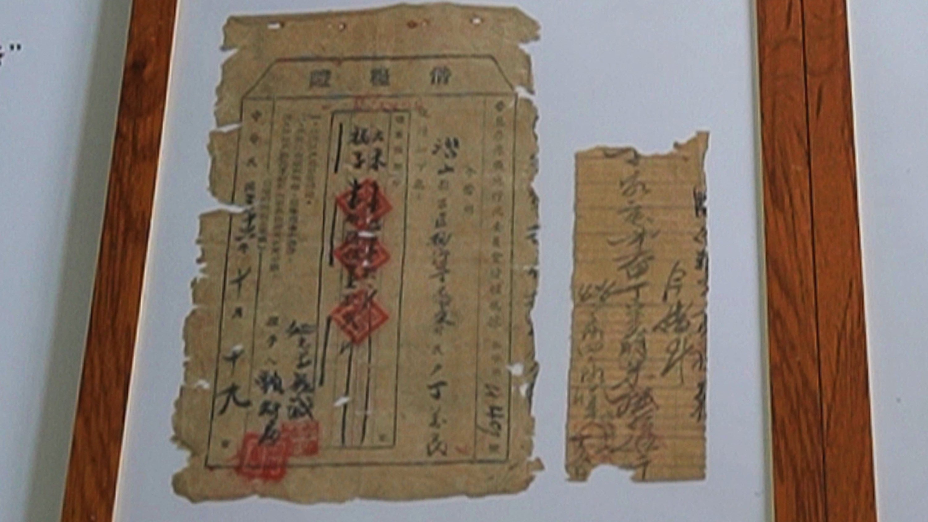 In 1947, a Chinese villager lent his entire 850kg grain supply to the army, receiving a handwritten receipt as an official IOU. Photo: CCTV