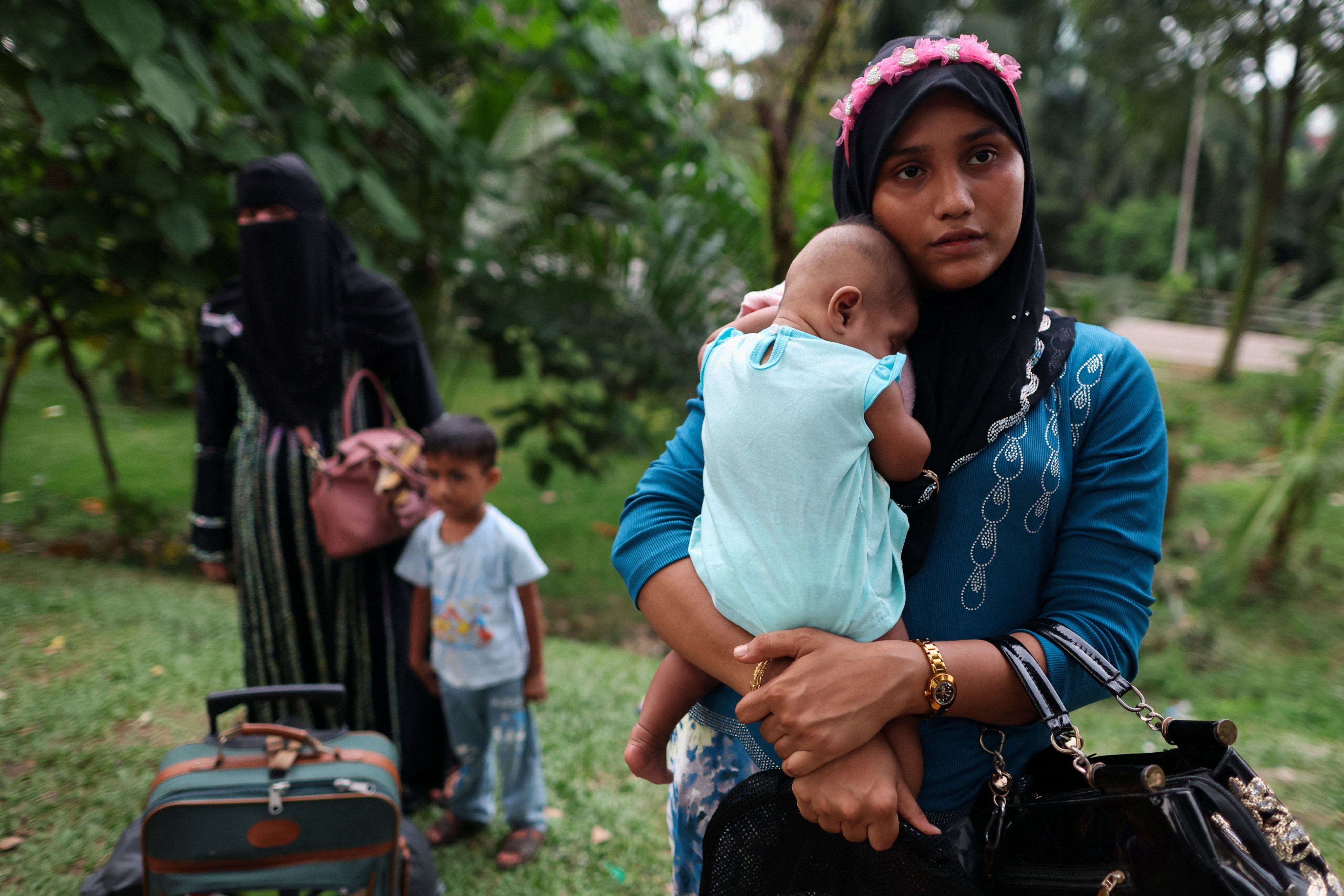 Rohingya refugees gather in front of the office of the UN refugee agency after being evicted from their homes, in Kuala Lumpur, Malaysia, on Monday. Photo: Reuters