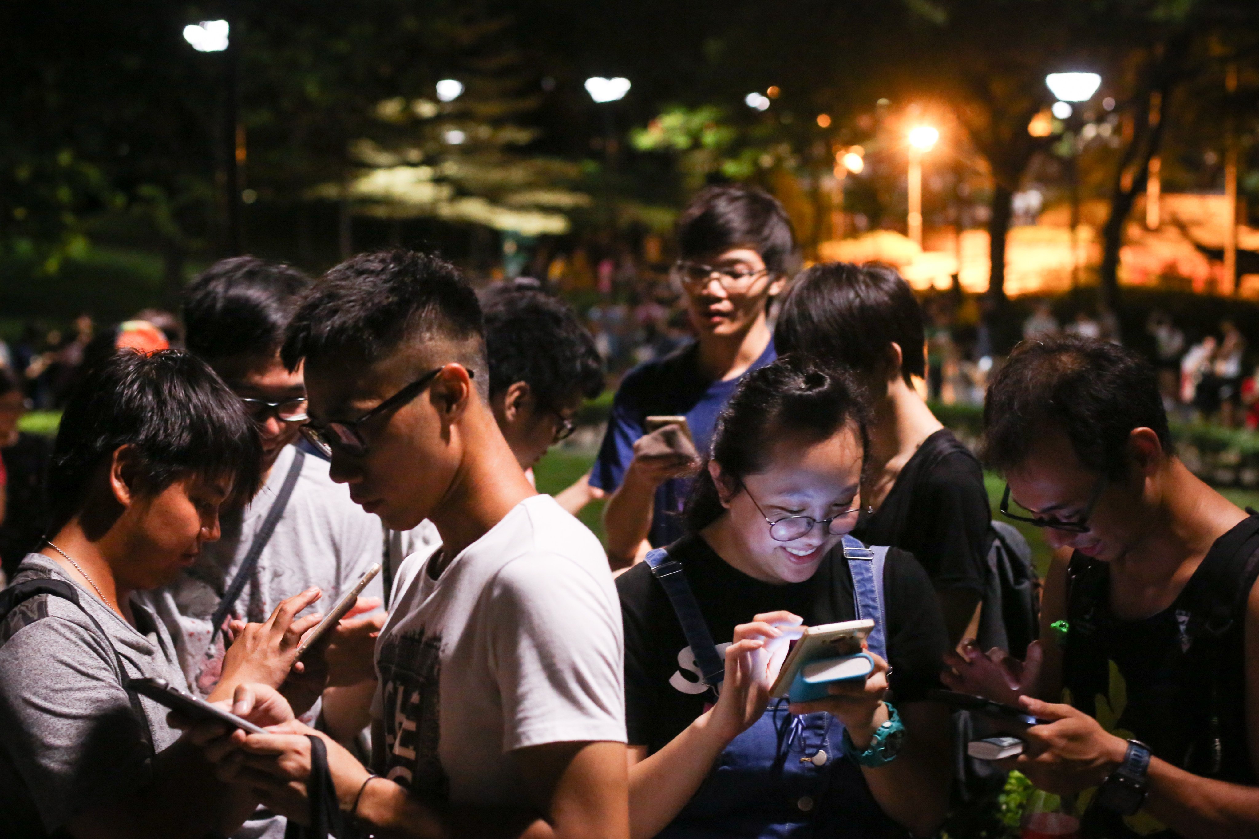 People gather to play Pokemon Go in Tuen Mun on July 28, 2016. Photo: Sam Tsang