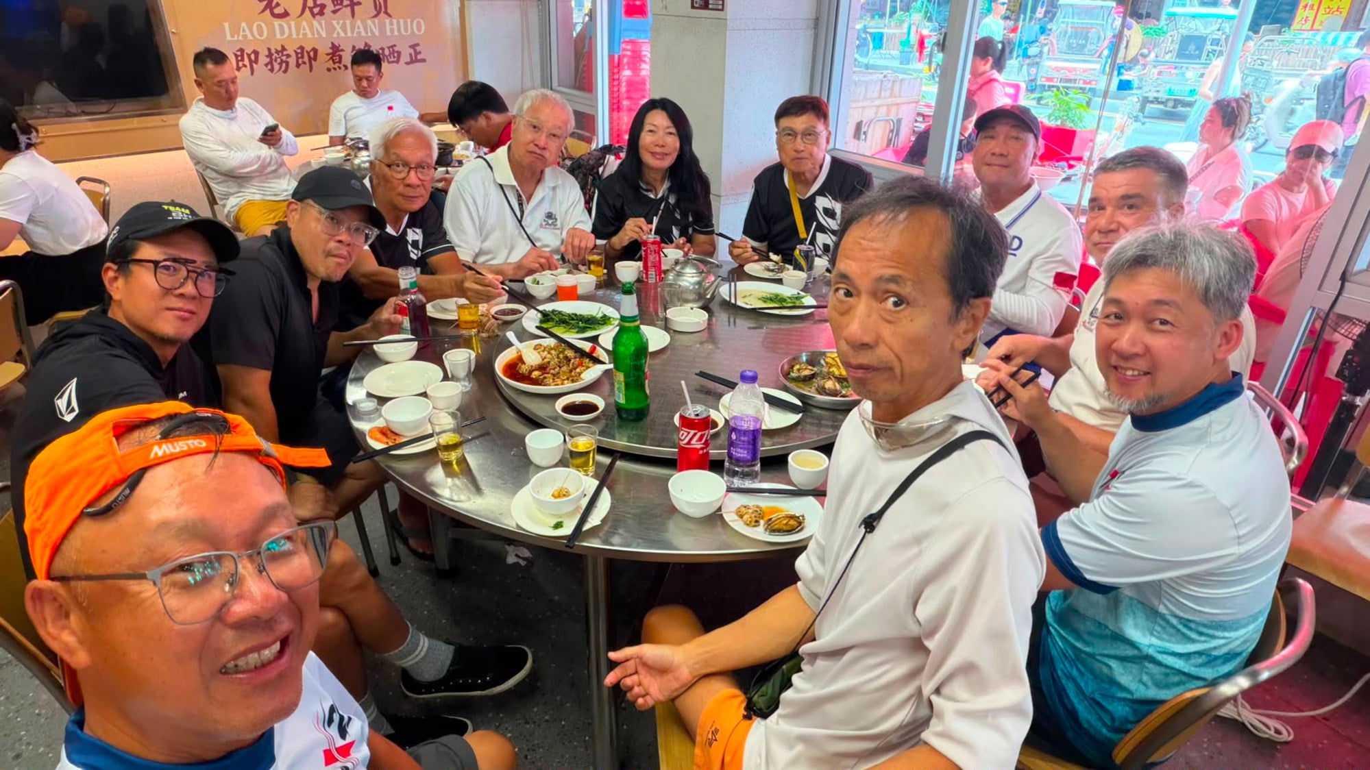 Thomas Wong (rear, black shirt) and his friends enjoy a seafood feast on Guishan Island. Photo: Handout Thomas Wong (rear, black shirt) and his friends enjoy a seafood feast on Guishan Island. Photo: Handout