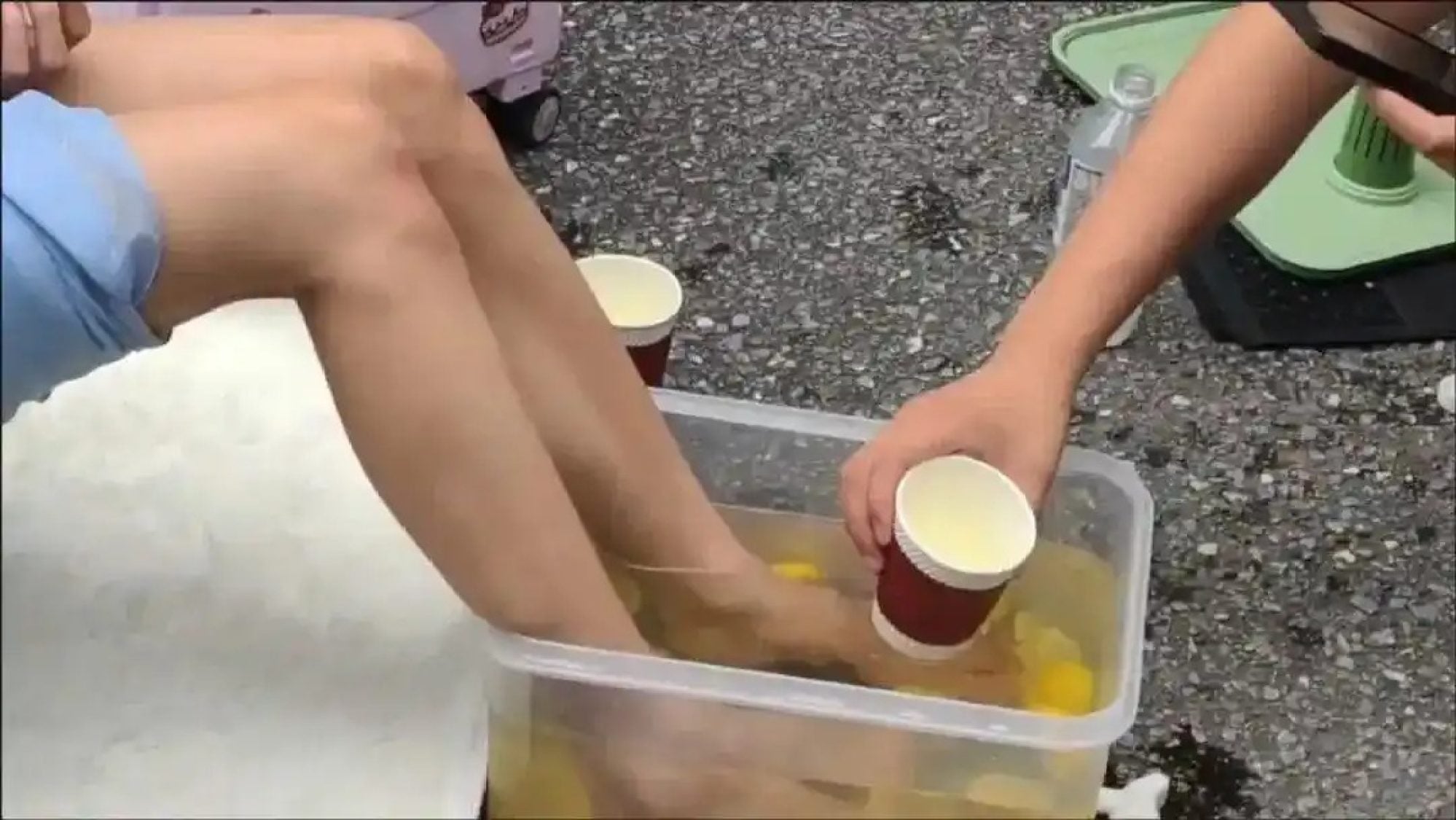 These cosplayers displayed their feet in boxes filled with lemon water, with companions using disposable cups to serve the beverage to intrigued spectators. Photo: Handout These cosplayers displayed their feet in boxes filled with lemon water, with companions using disposable cups to serve the beverage to intrigued spectators. Photo: Handout