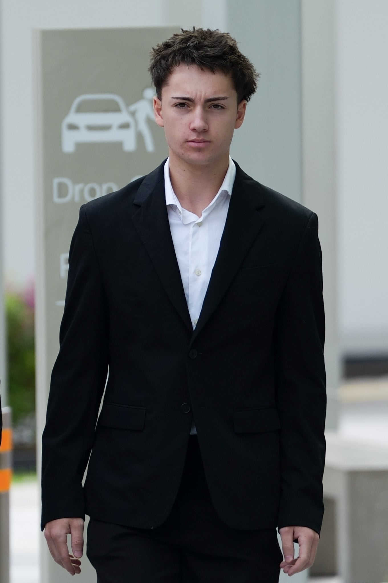 Didier Maximilien arrives at the State Courts building in Singapore on Thursday, Photo: AP