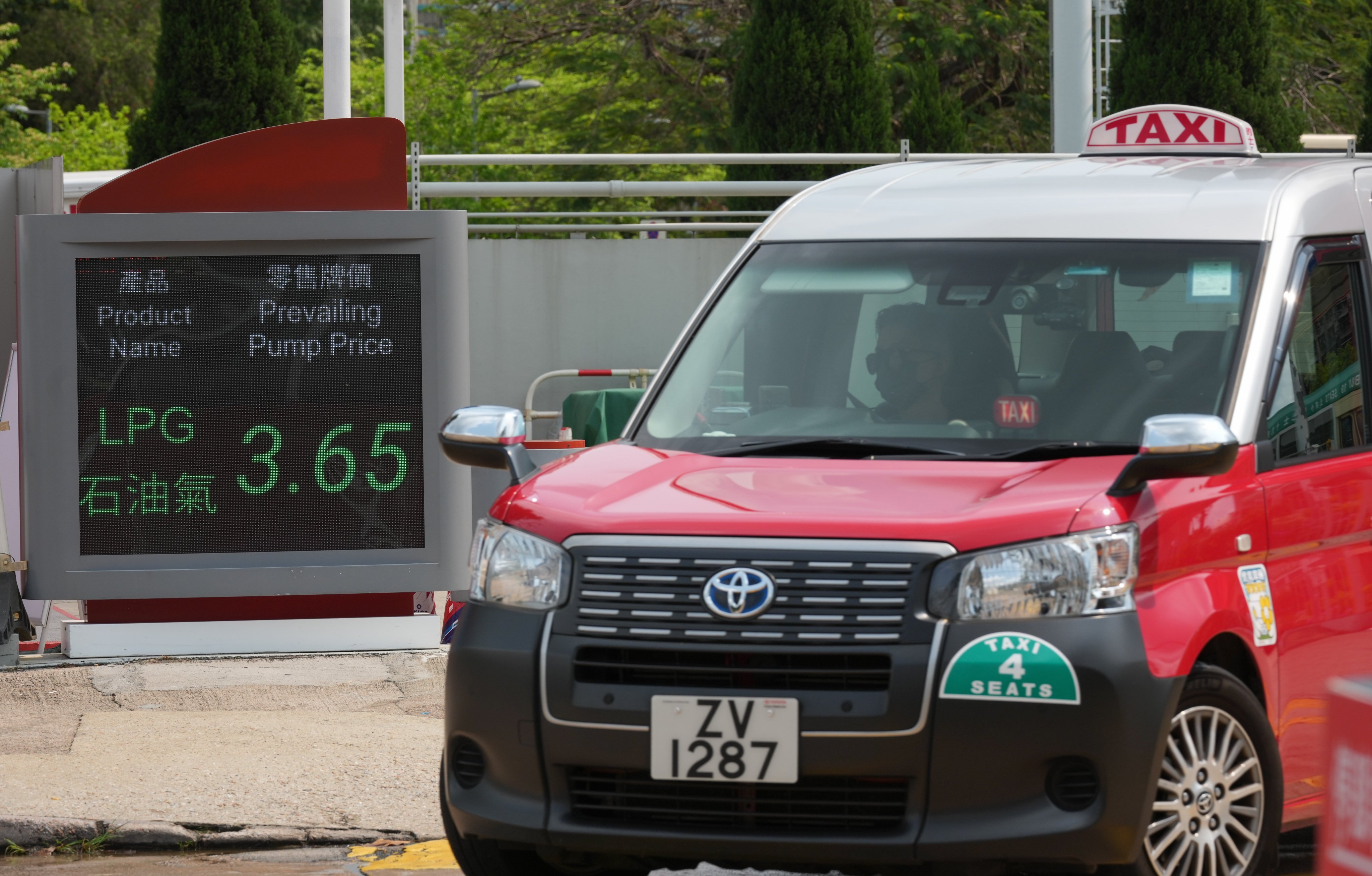 A taxi passes an LPG filling station in Yuen Chau Tsai. Photo: Jelly Tse