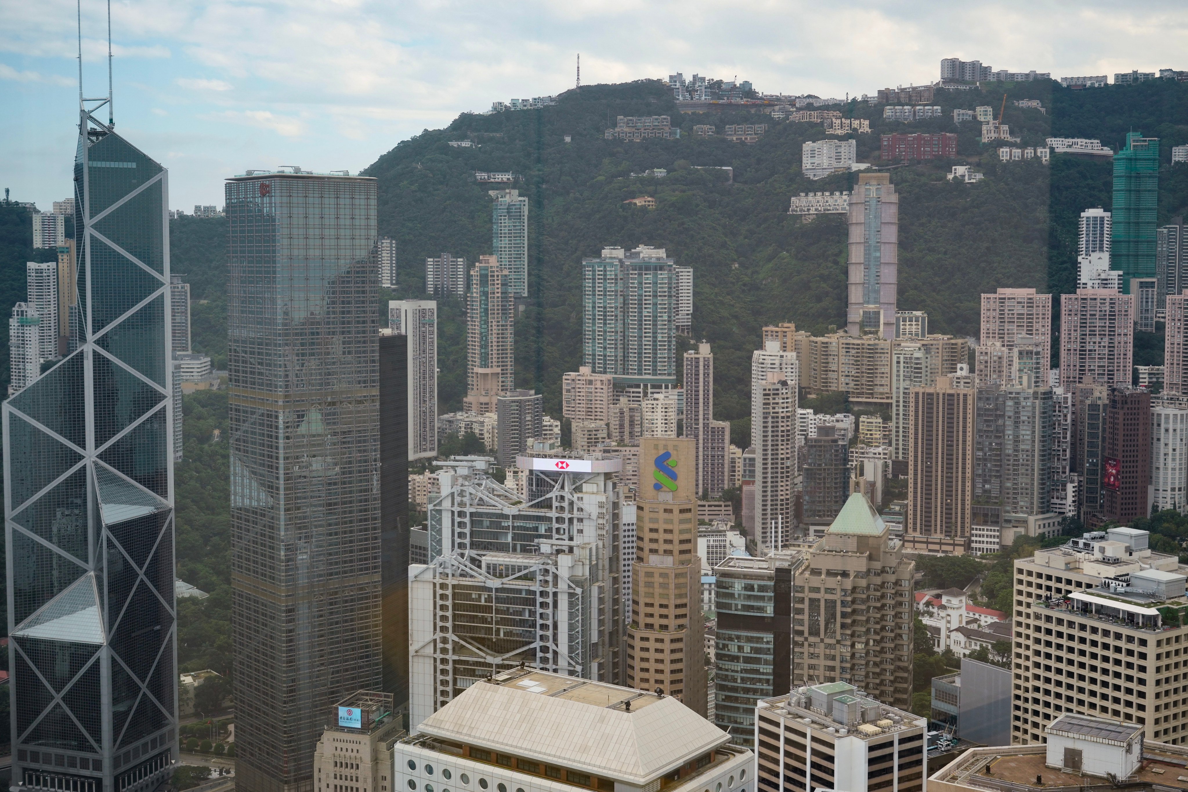 A view of financial buildings, including HSBC and Standard Chartered, from the Hong Kong Monetary Authority headquarters. A think tank has proposed encouraging the two banks to relocate from Hong Kong amid concern about Beijng's tightened control over the city. Photo: May Tse