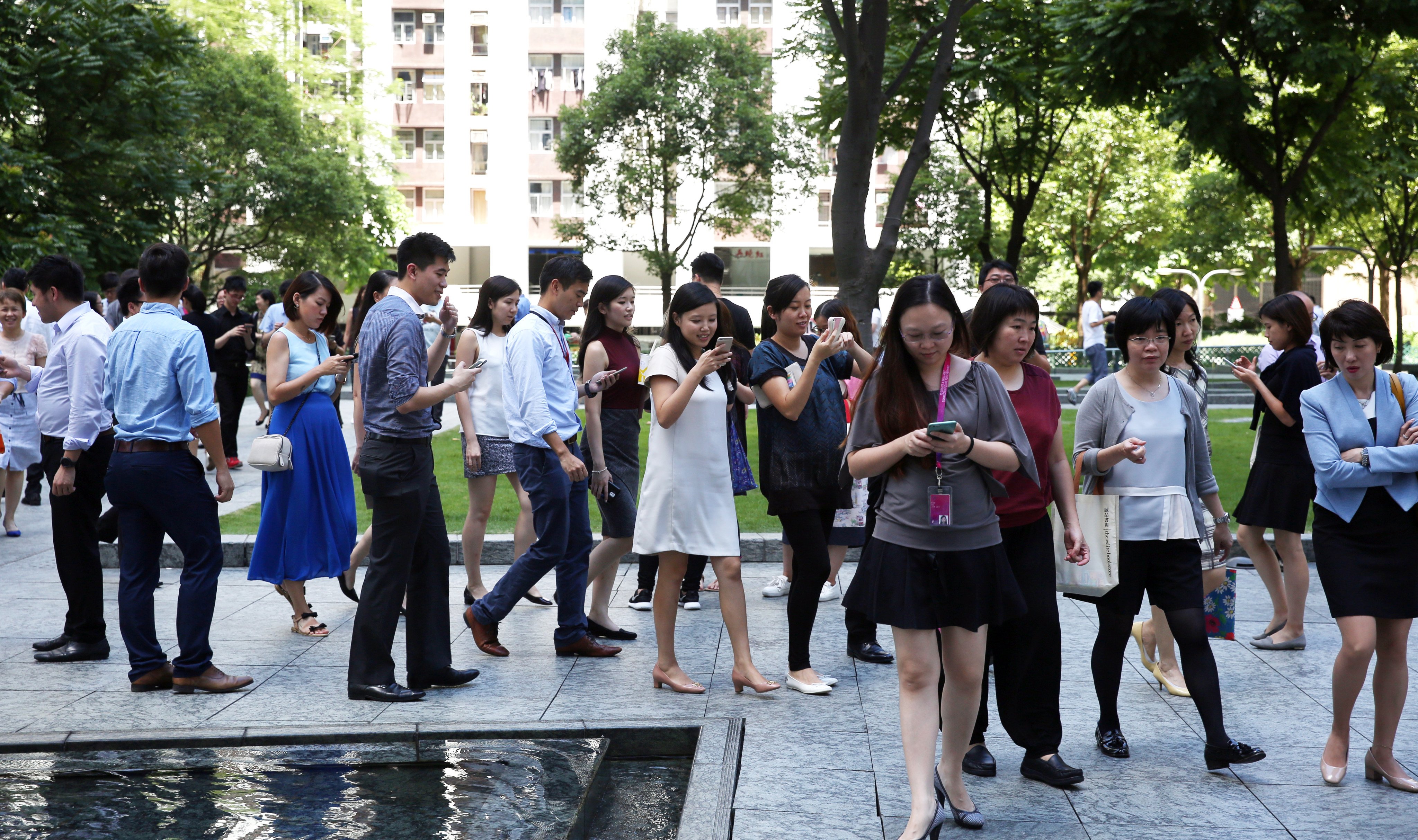 People play Pokemon Go in Quarry Bay on July 28, 2016. Photo: Sam Tsang