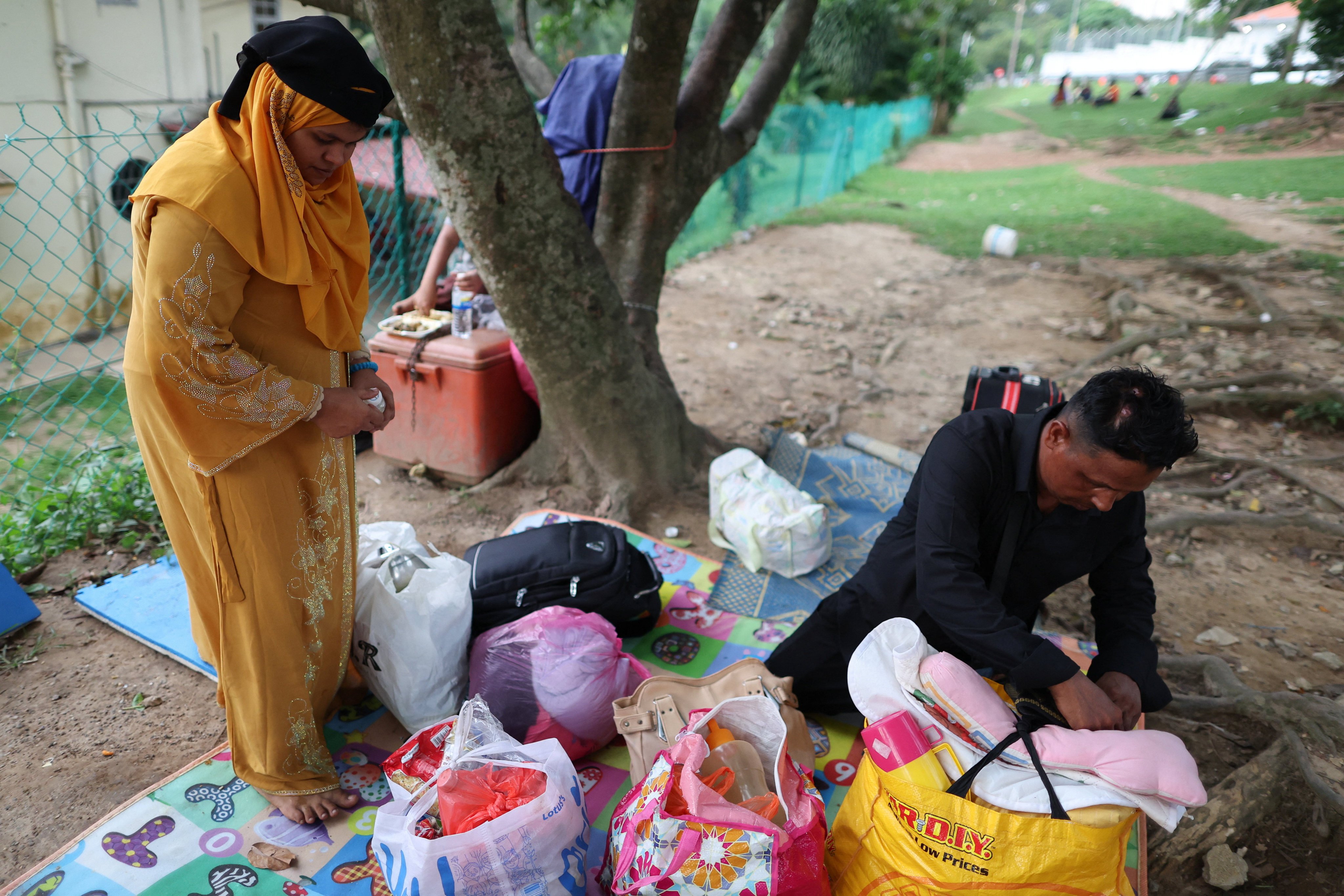 Rohingya refugees gather in front of the office of the UN Refugee Agency after being evicted from their homes, in Kuala Lumpur, Malaysia on Monday. Photo: Reuters