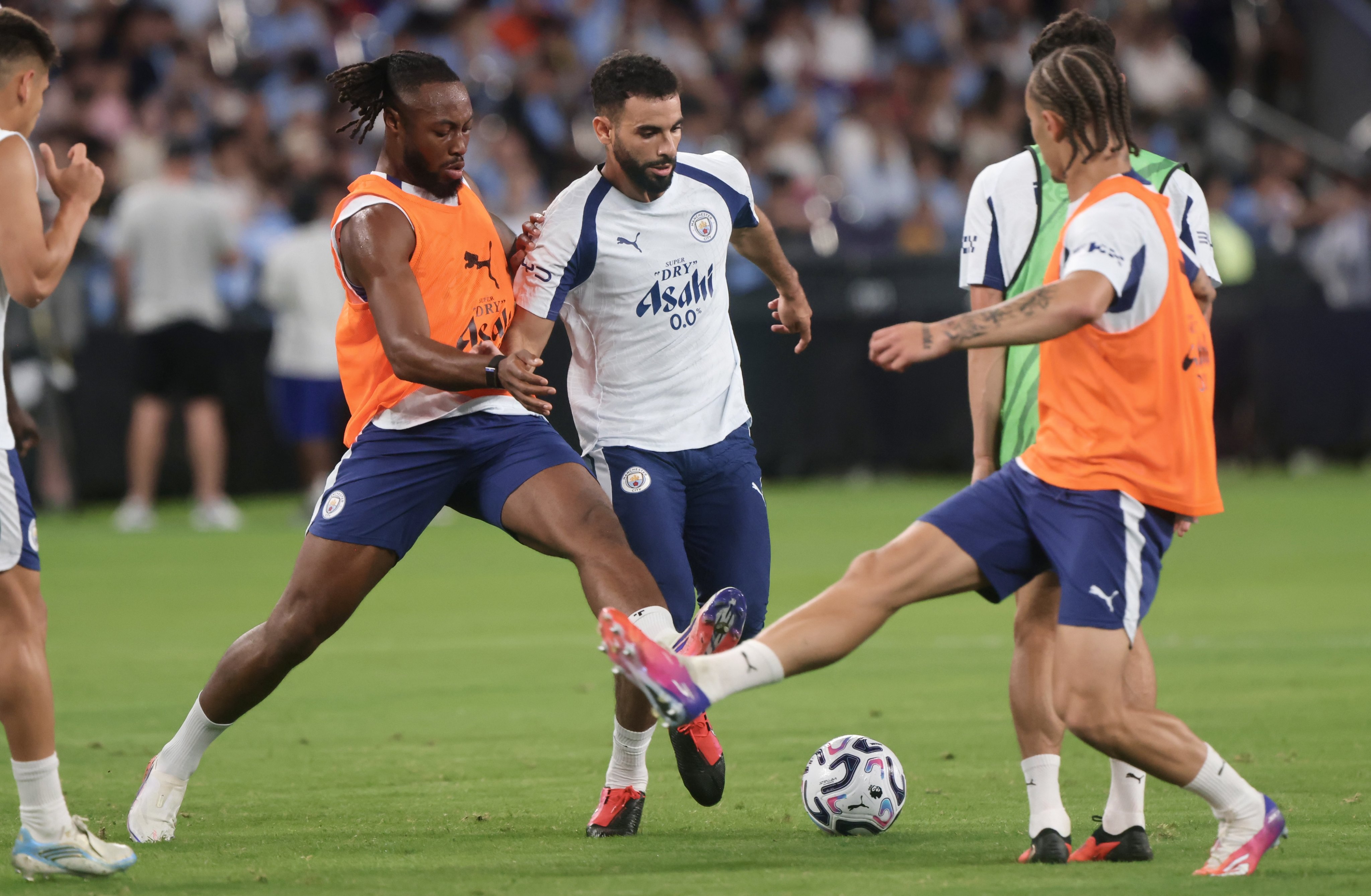 Rayan Ait-Nouri fends off Antoine Semenyo during Manchester City’s training session at Kai Tak Stadium. Photo: Jonathan Wong