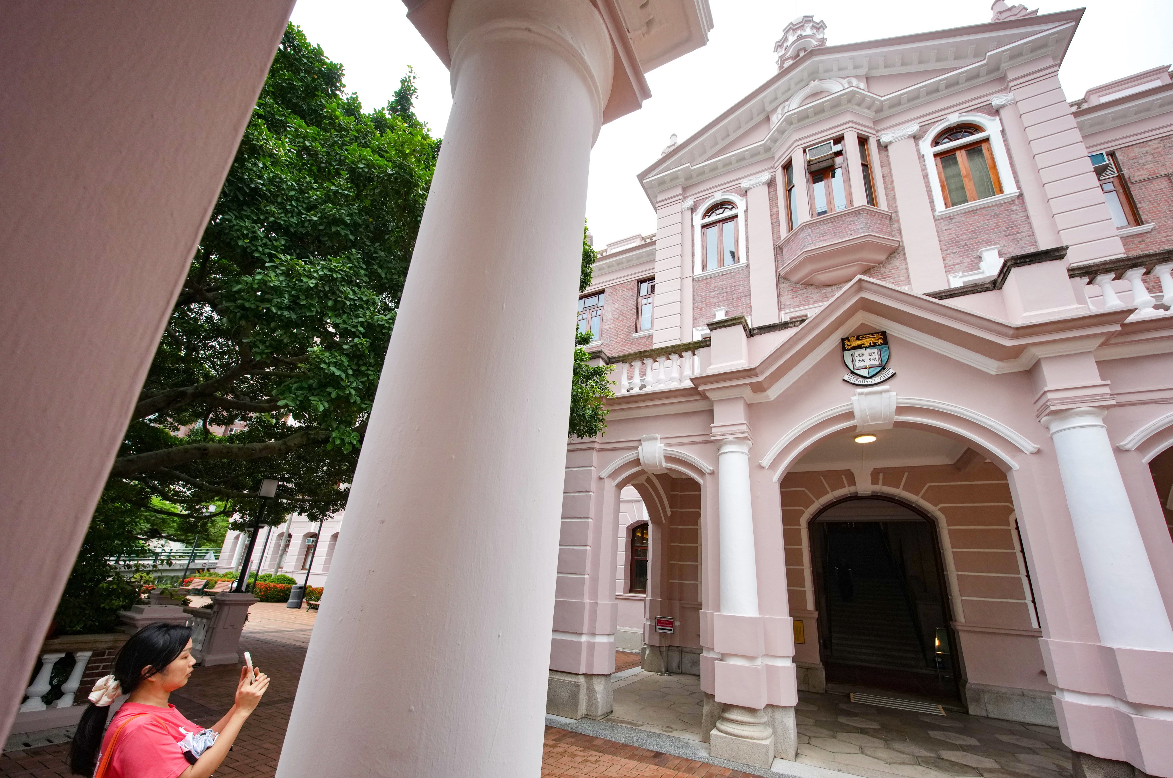 The main building of the University of Hong Kong in Pok Fu Lam. Currently, students who receive dependant visas or entry permits when they are minors are considered local and can apply for government-funded programmes. Photo: Karma Lo