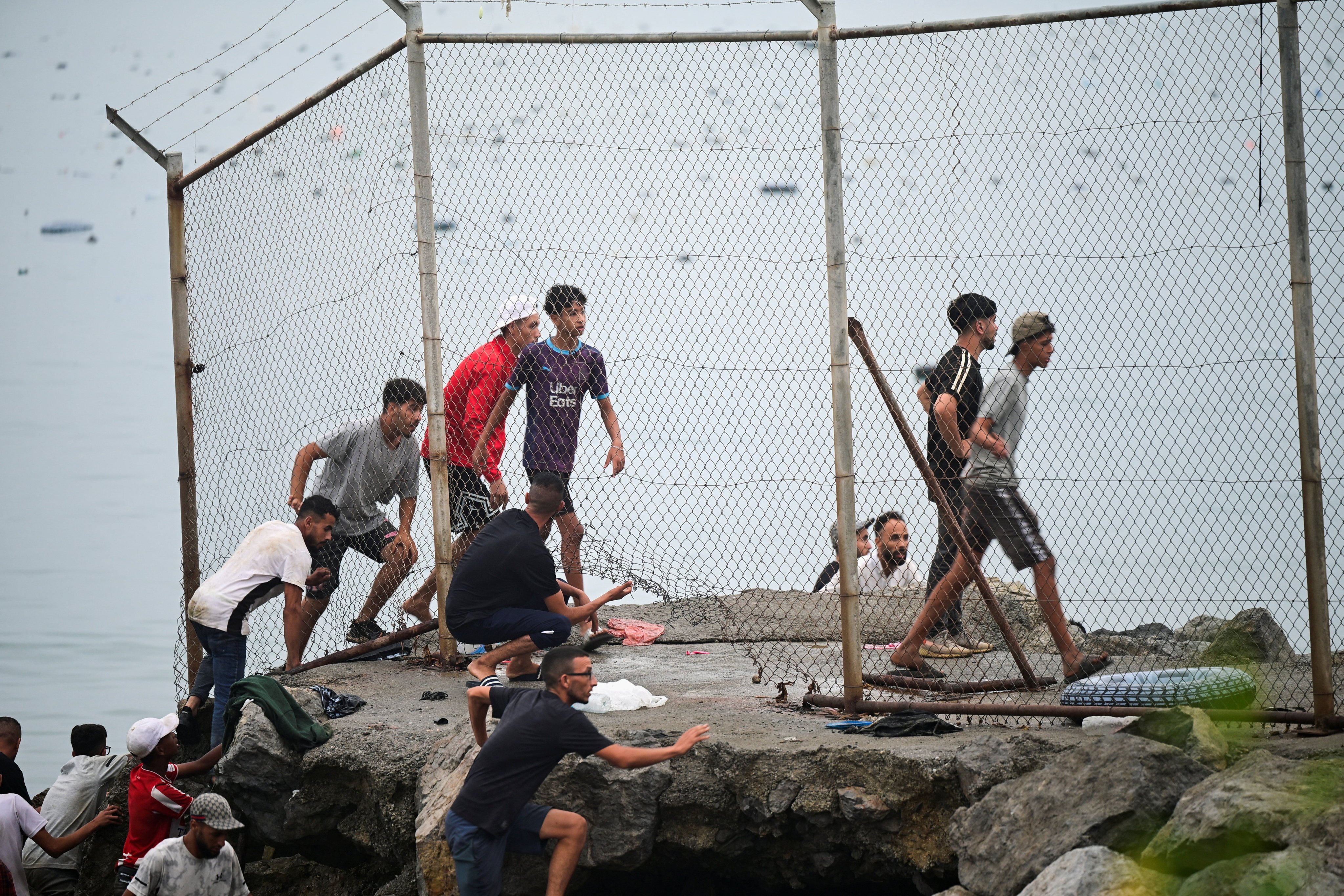 Migrants return to Morocco, as seen from Ceuta, Spain on Friday. Photo: Reuters