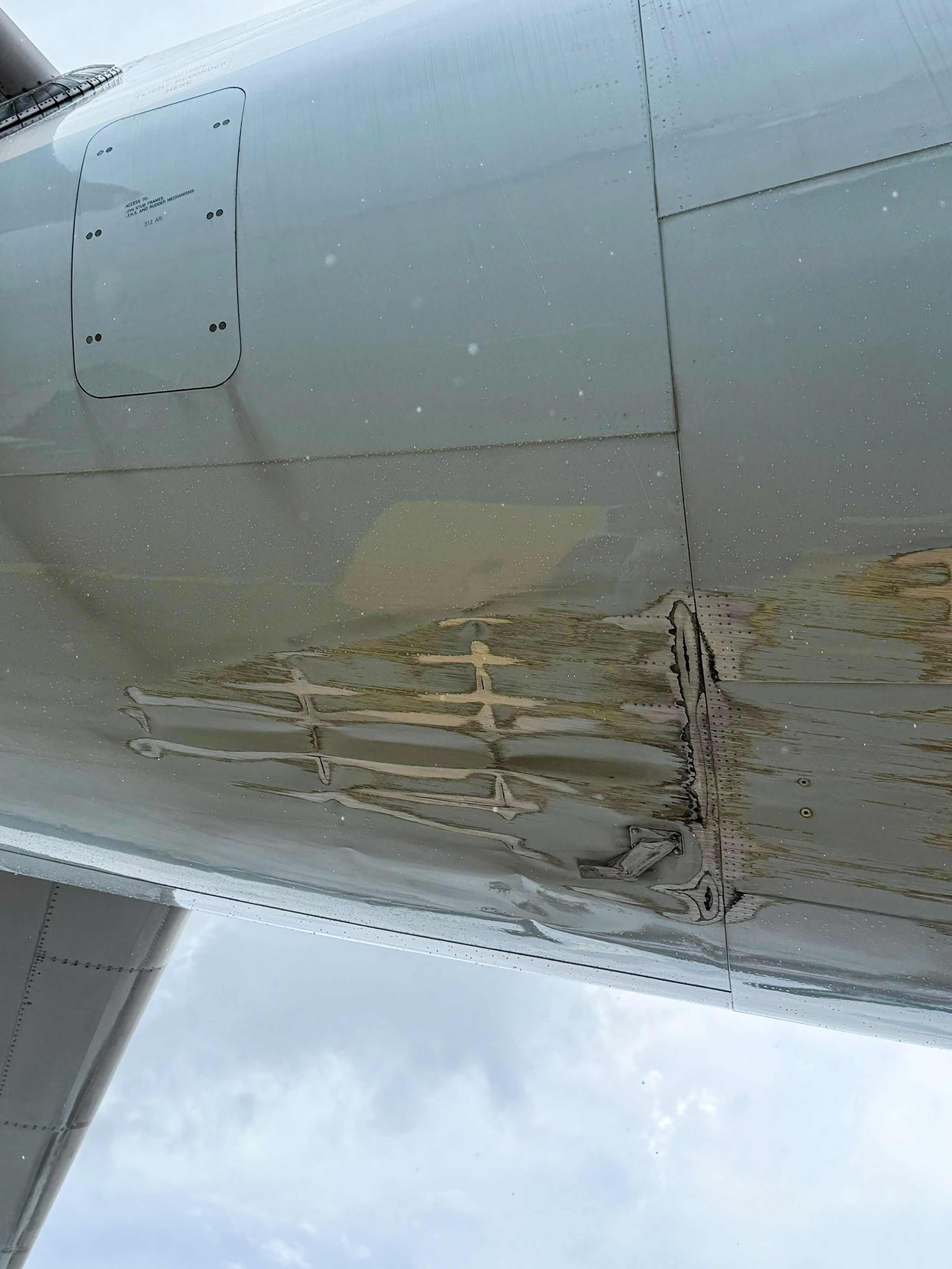 The aircraft sustained signs of abrasion on the lower fuselage skin. Photo: Handout