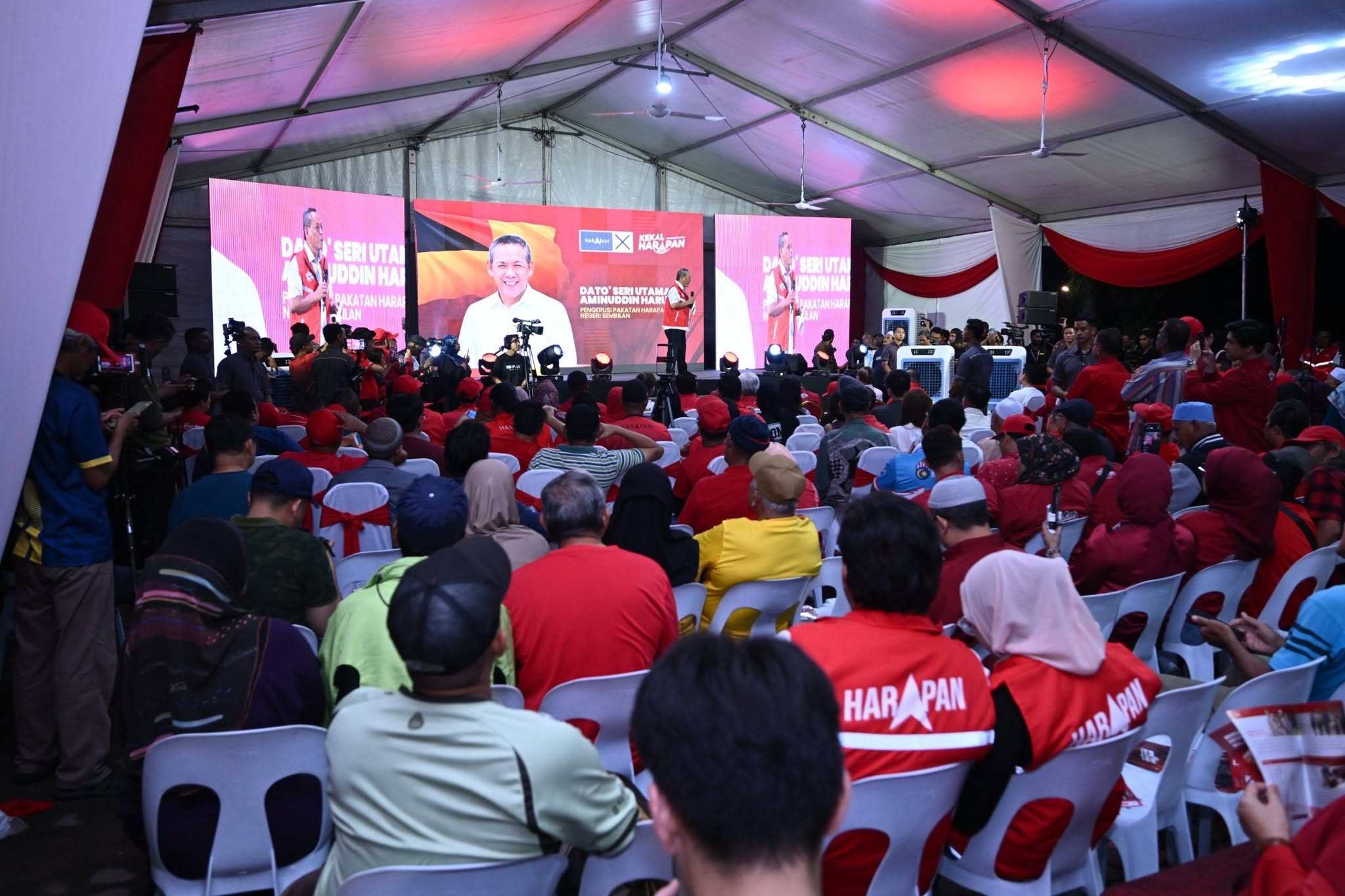 Pakatan Harapan supporters listen to a Negeri Sembilan candidate's speech on July 23. Photo: Facebook/pakatanharapan.my