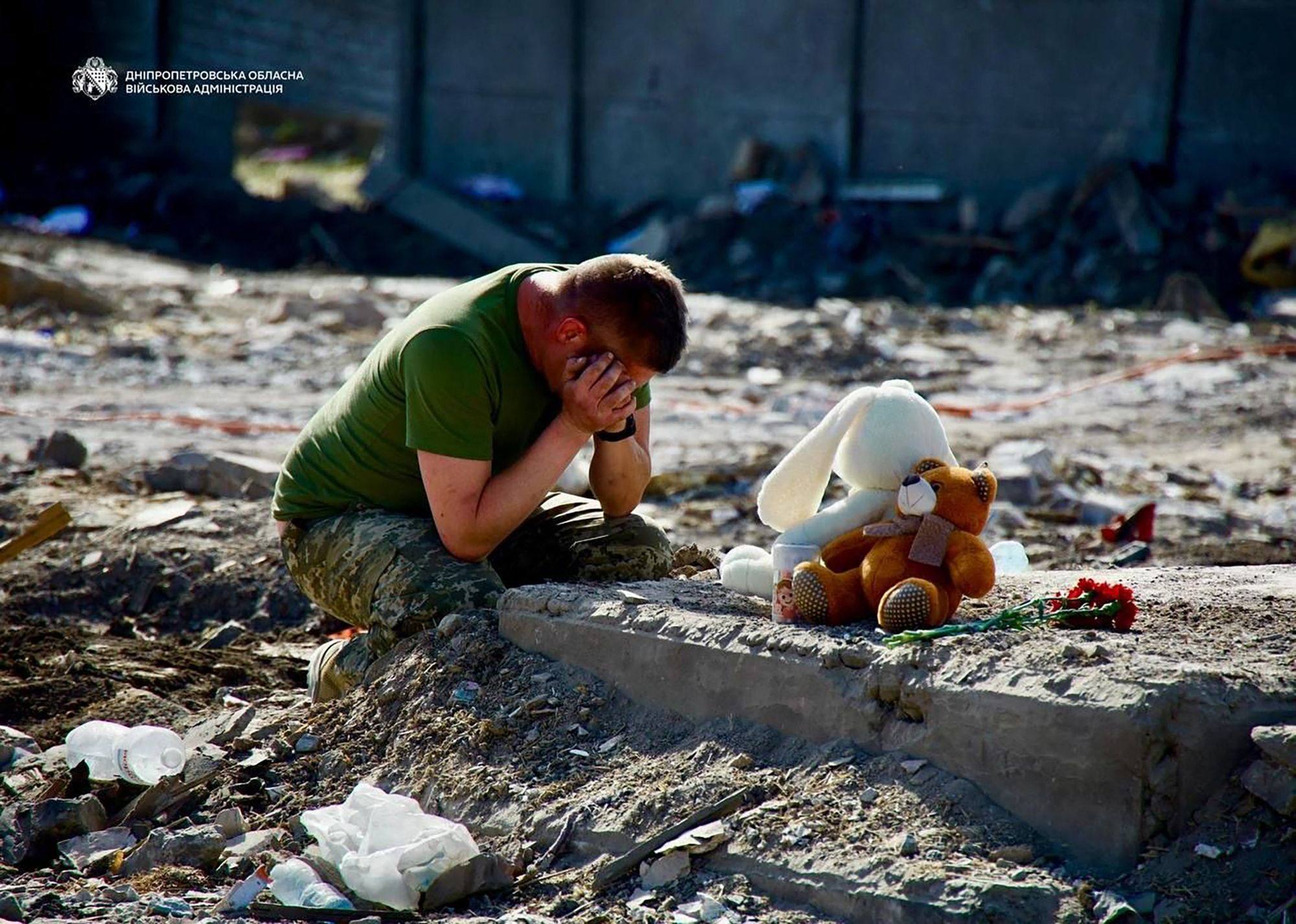 A man mourns at the site of a destroyed house following an air attack in Radushne, Kryvyi Rig region, in Ukraine on Thursday. Photo: Dnipropetrovsk Regional Military Administration via AFP