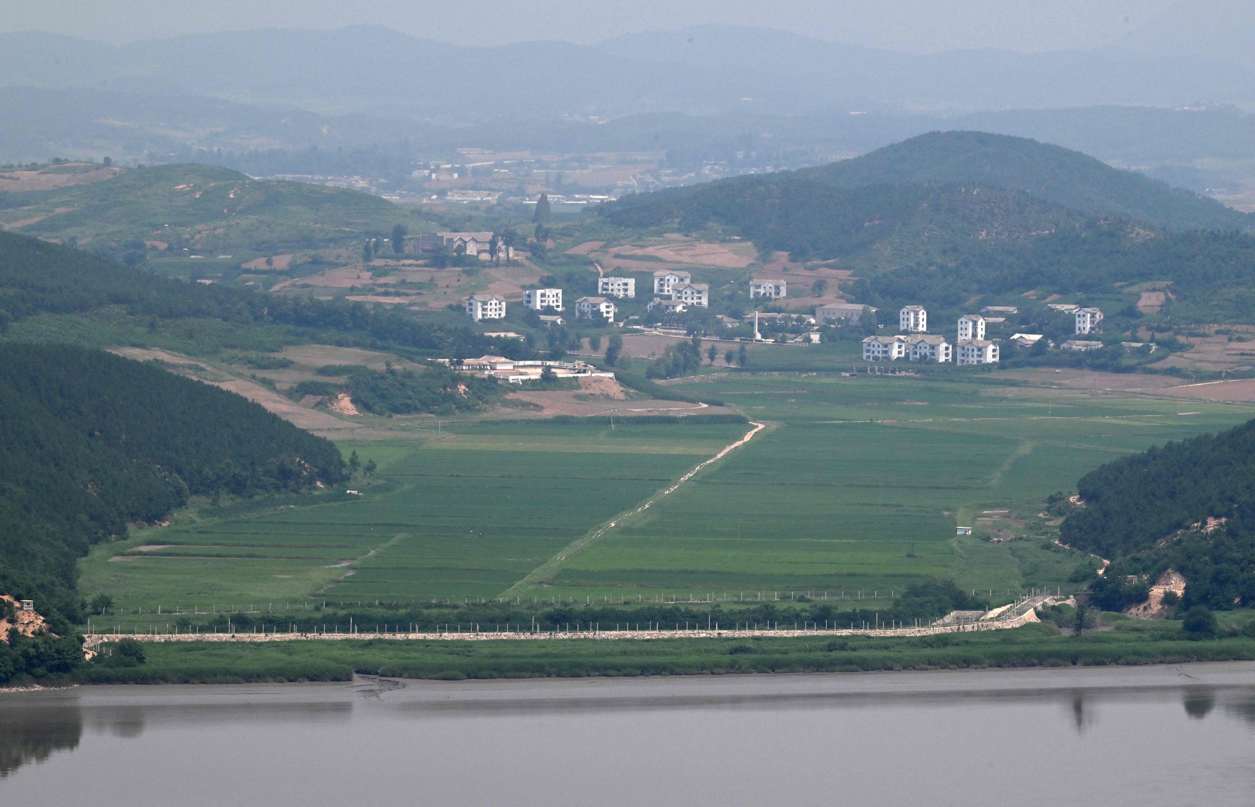 North Korea’s border county of Gaepung is seen from a South Korean observation deck at Aegibong Peace Ecopark in Gimpo on July 1. Photo: AFP