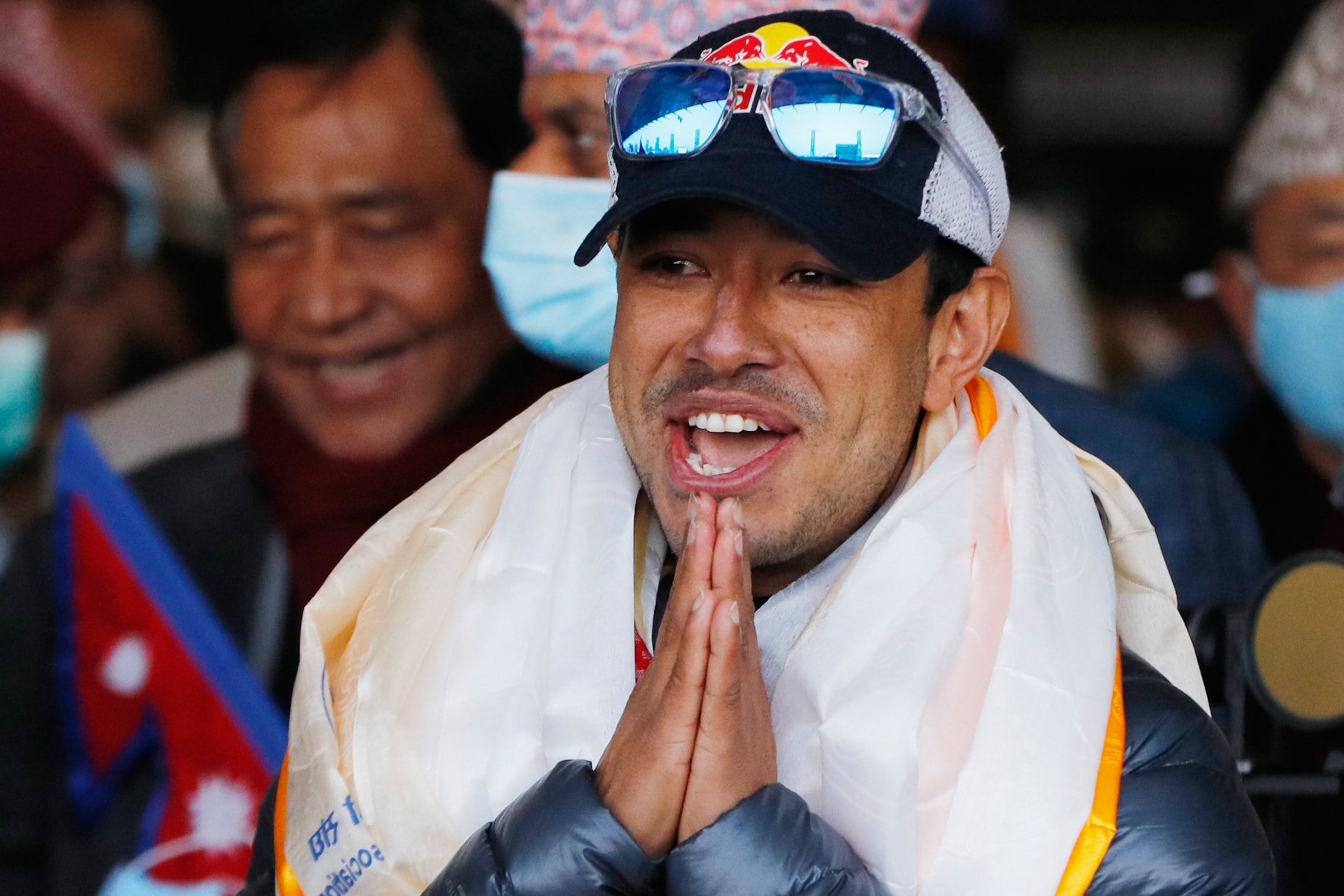 Nirmal Purja arrives at Tribhuwan International airport in Kathmandu, Nepal in 2021. Purja, who served with British special ‌forces as a Gurkha, completed the record-breaking feat in ⁠six months in 2019. Photo: AP