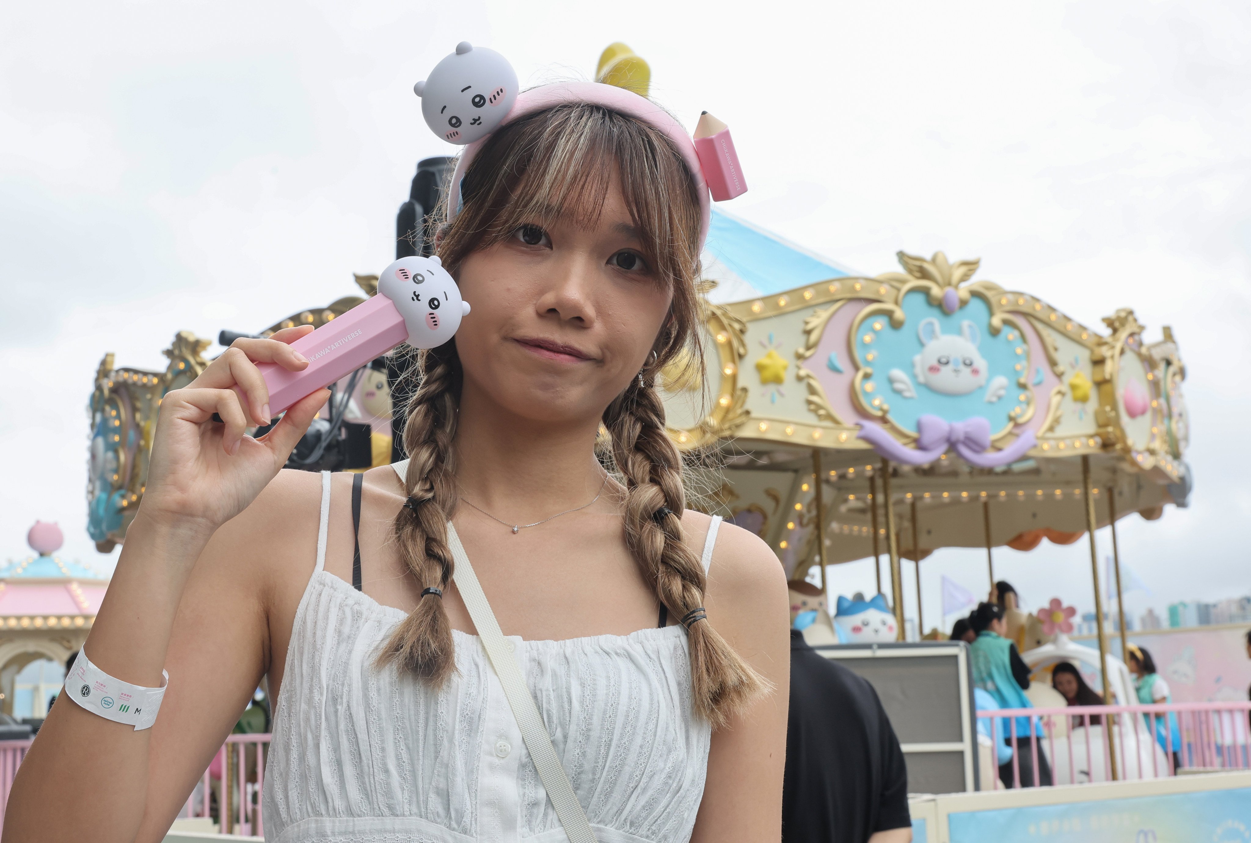 Chiikawa fan Sammy Ma spent about HK$1,000 on a fluffy headband, stickers and blind boxes. Photo: Edmond So