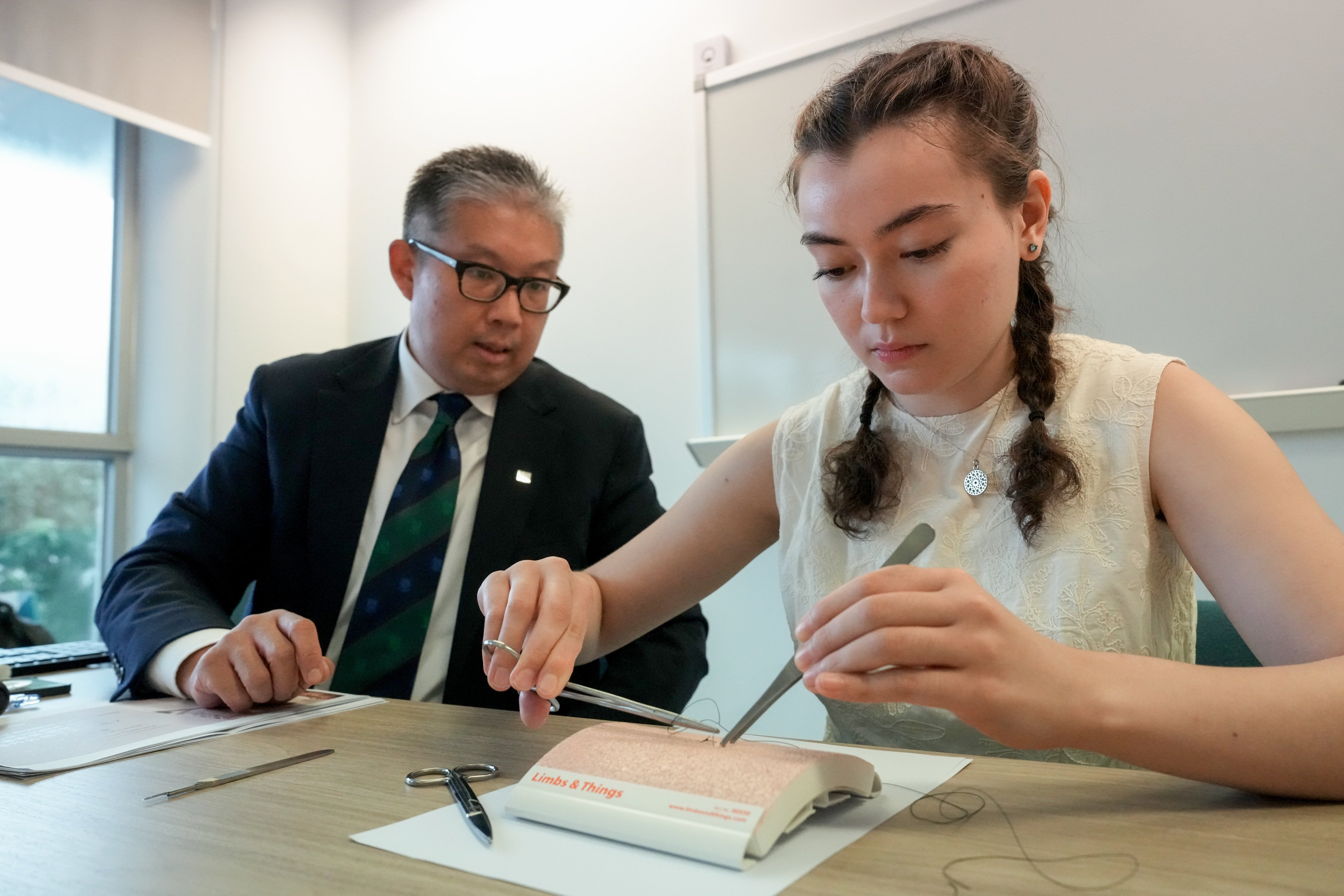 Professor Michael Co (left), assistant dean of pedagogy and assessment at HKU’s medical school, and Sien Gurr, a final-year medical student who plays the violin and guitar. Photo: Dickson Lee