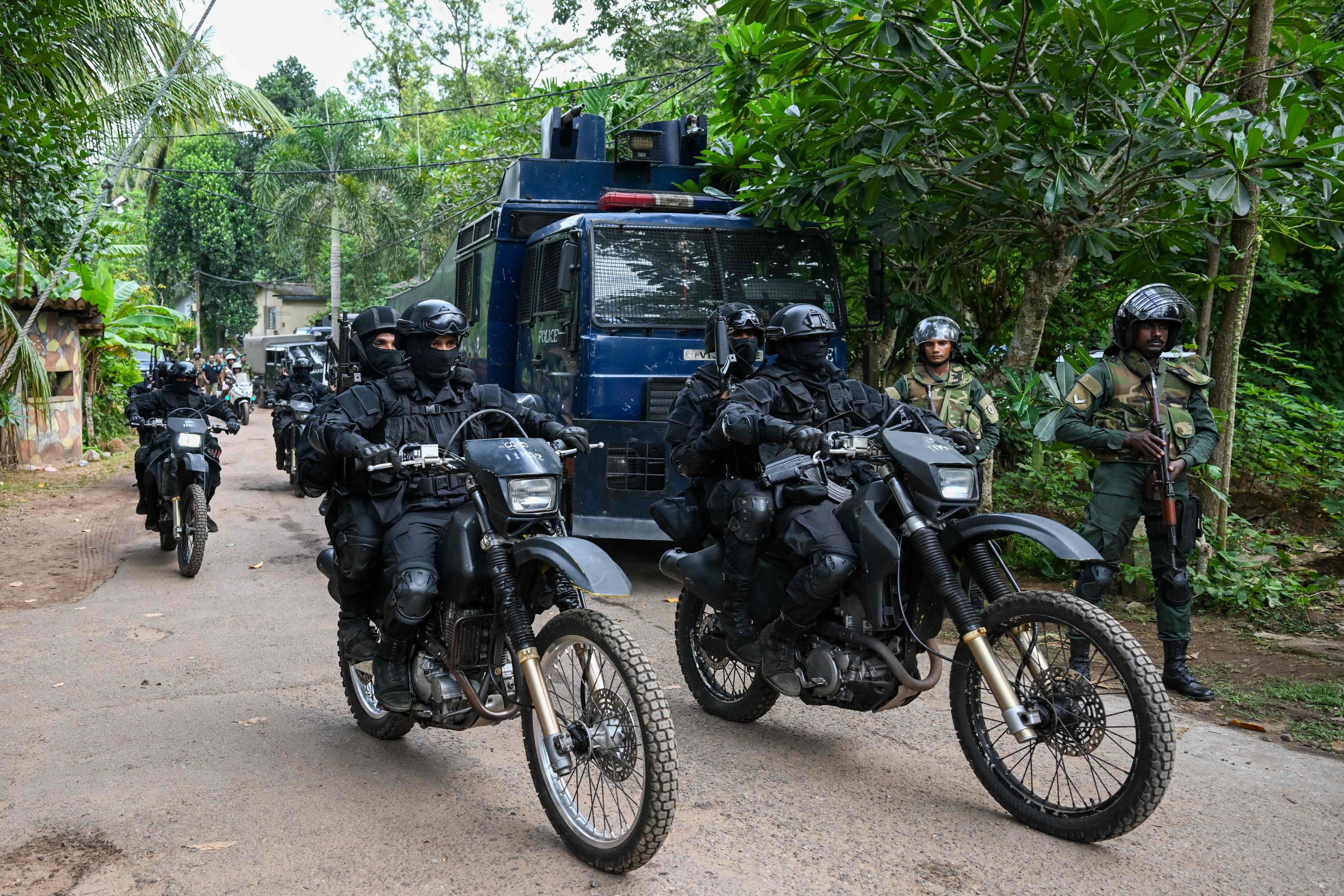 Military personnel patrol outside at the Mahara Prison complex on Sunday. Photo: AFP