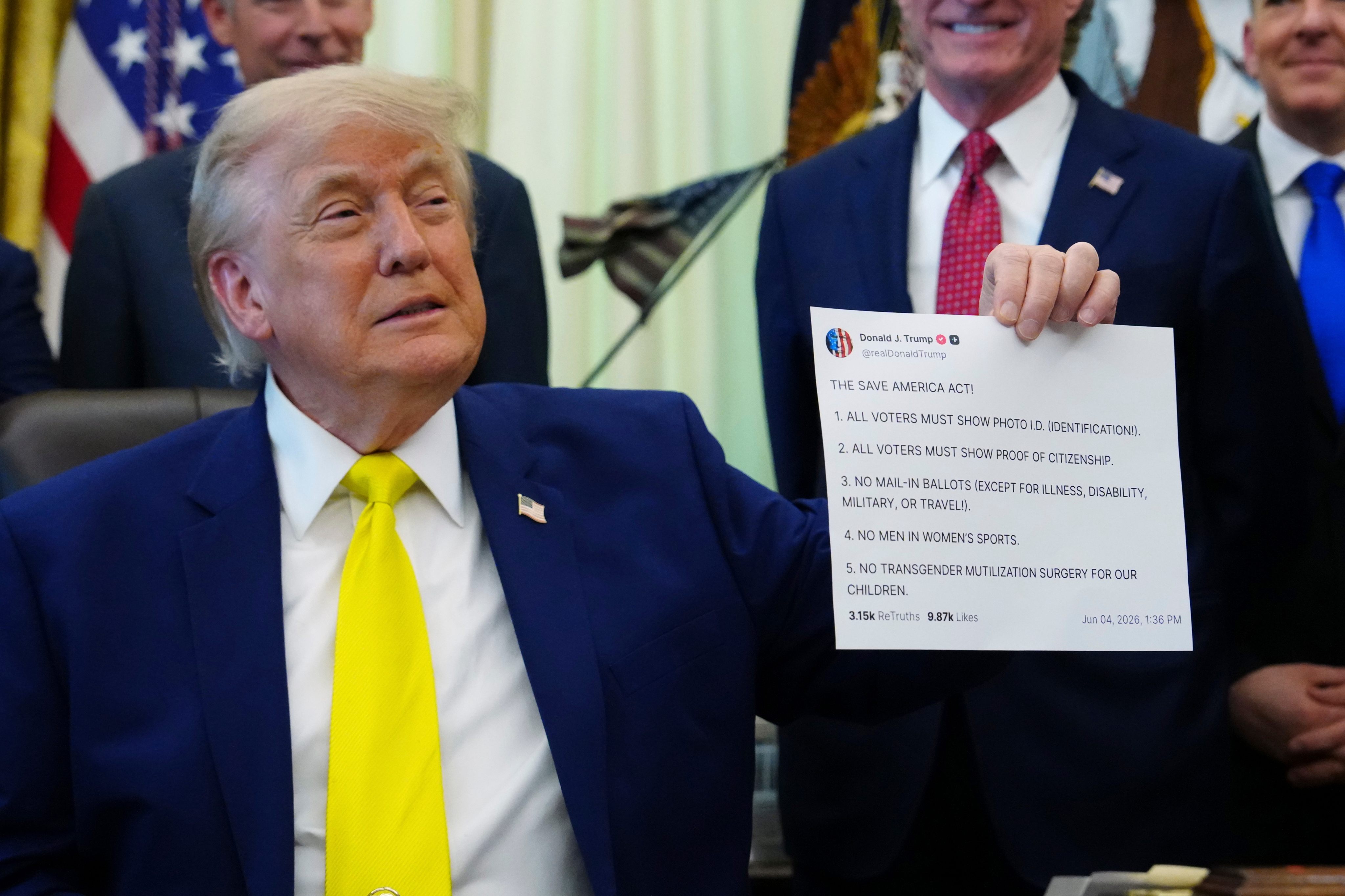 President Donald Trump holds up an image taken from his Truth Social account at the Oval Office on June 4. Photo: AP
