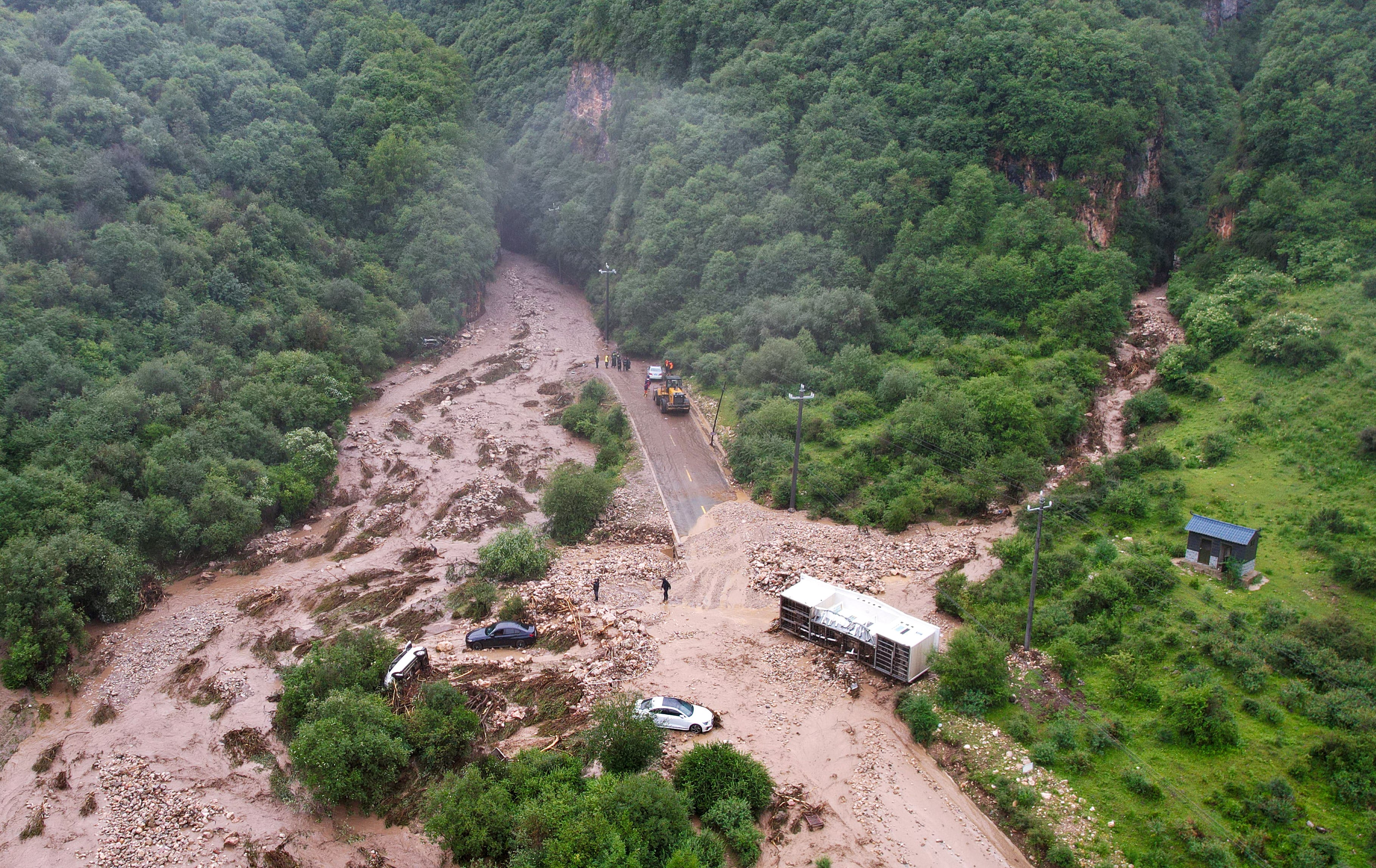The aftermath of flash floods in Gansu province. Photo: Xinhua