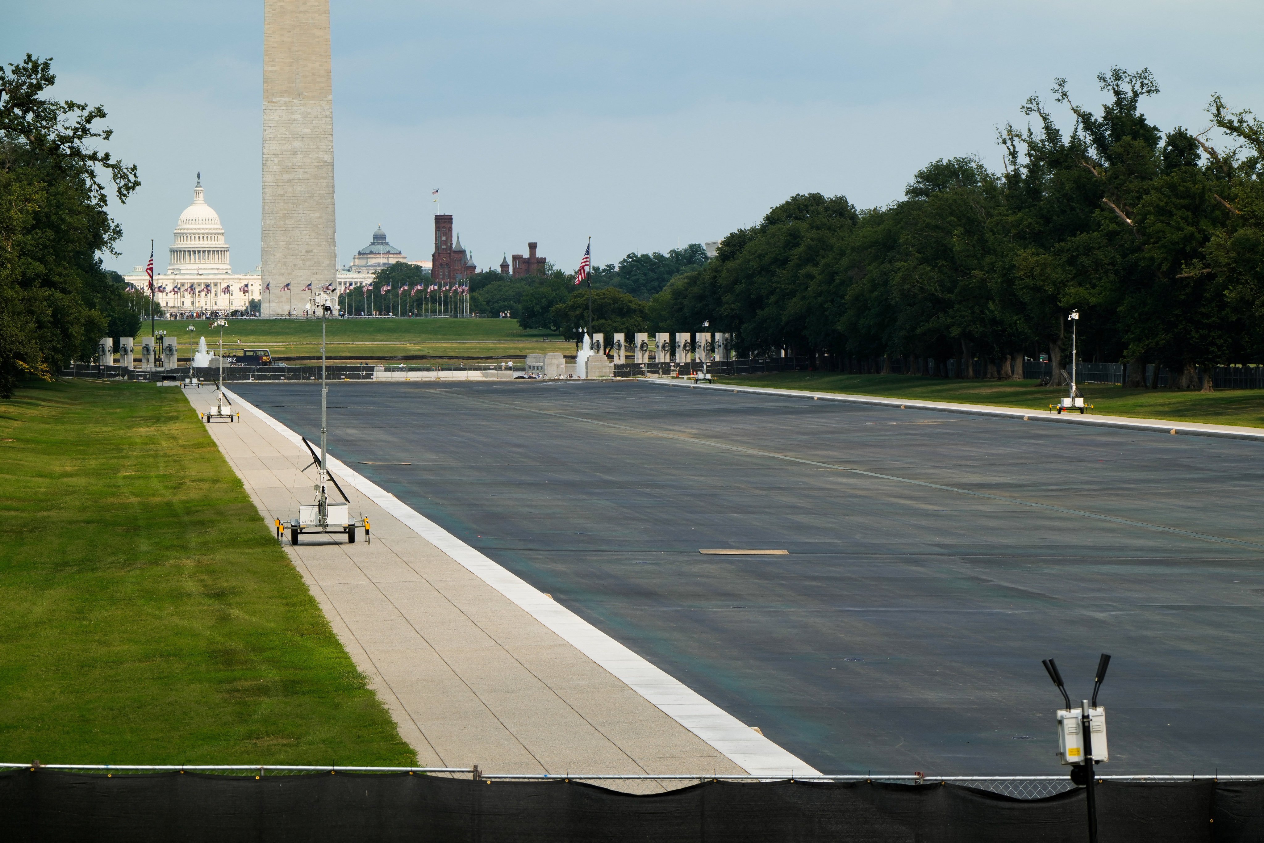 Mobile security cameras stationed inside fences at the drained Lincoln Memorial Reflecting Pool in Washington. Photo: Reuters