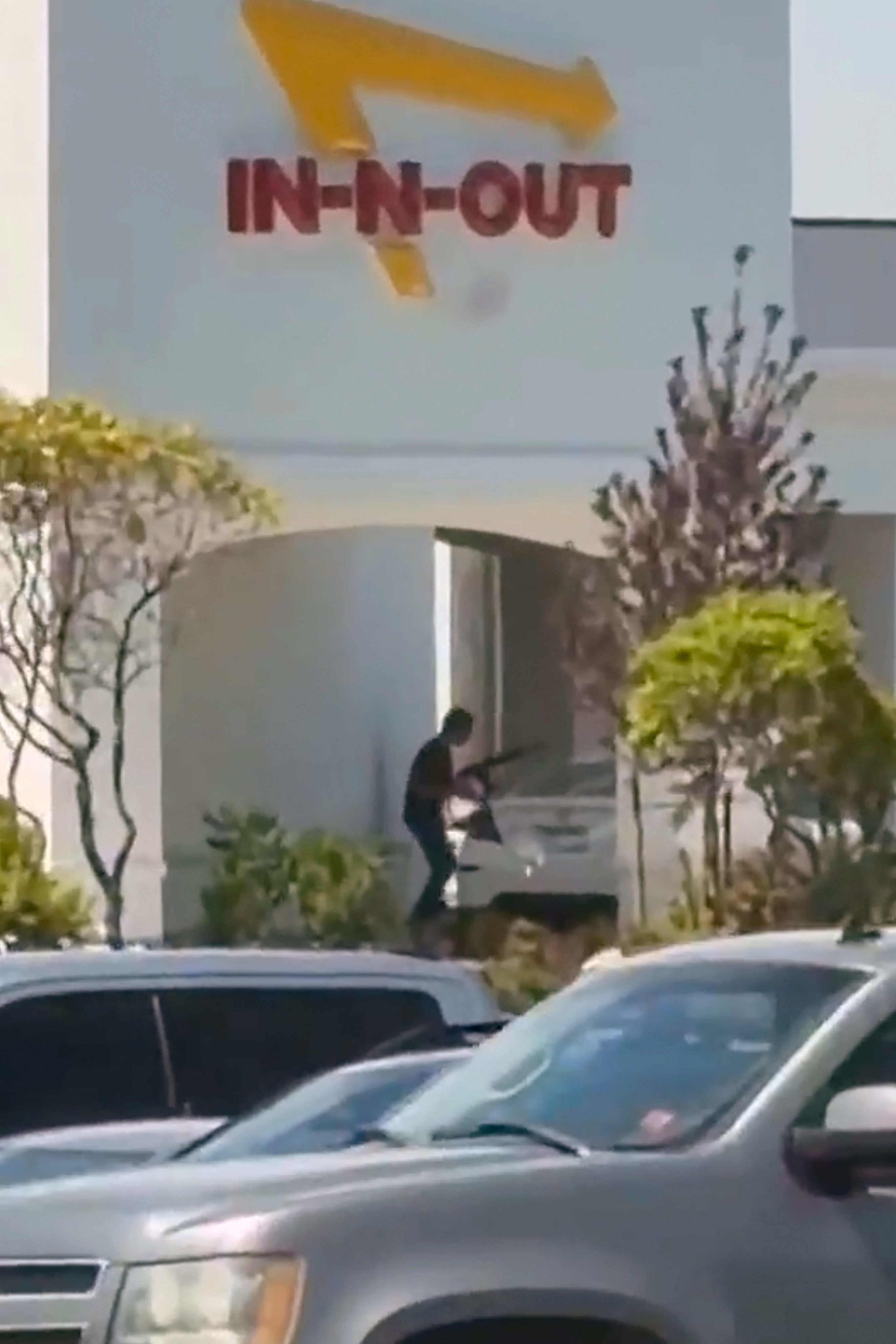 A still image captured from video by a witness shows the scene of a shooting that started at an In-N-Out Burger restaurant in Twin Falls, Idaho on Saturday. Photo: AP
