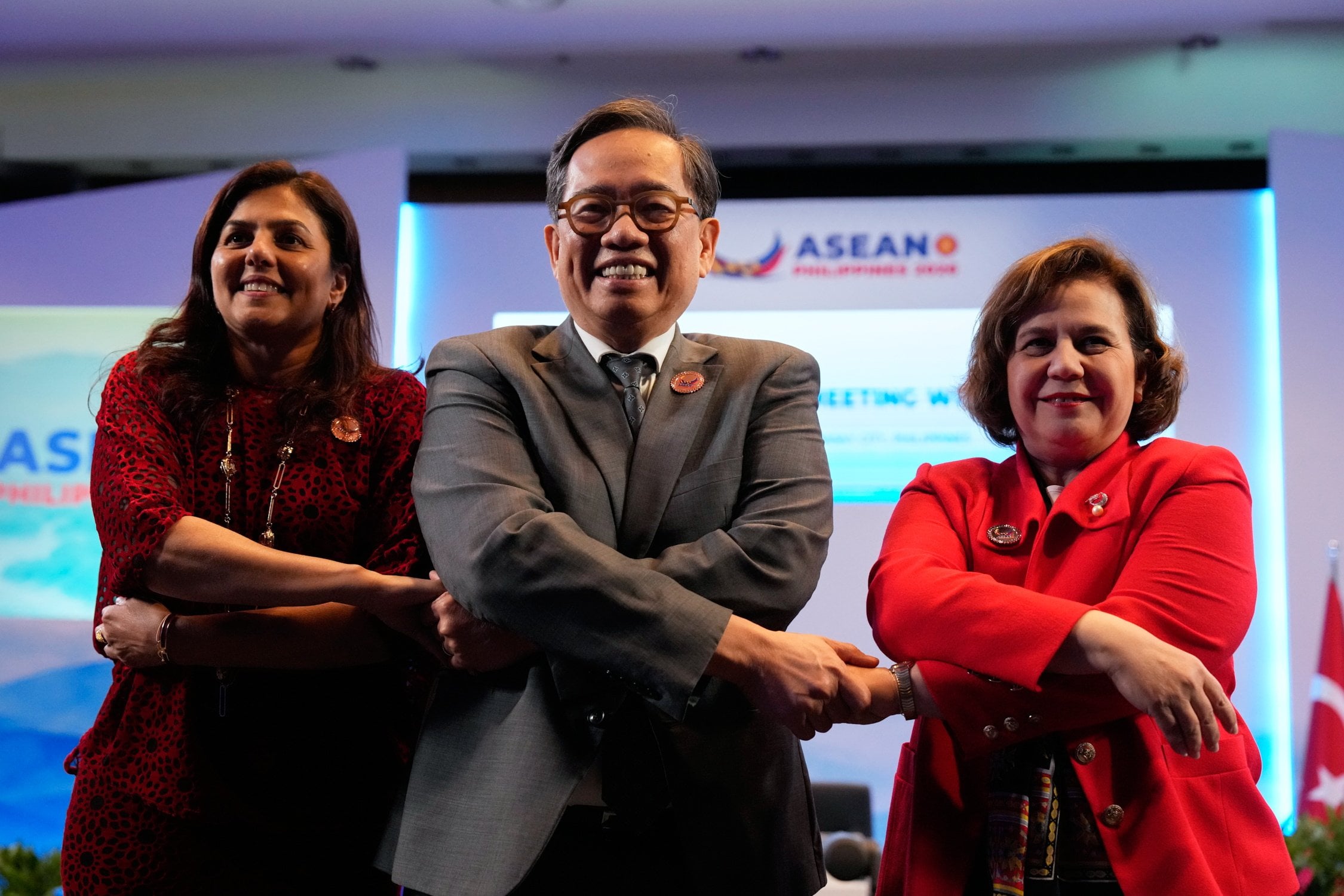 Turkey’s Deputy Foreign Minister Berris Ekinci (right) poses for a photo with Philippine Foreign Affairs Undersecretary Leo Herrera Lim (centre) and Asean Political-Security Community Deputy Secretary General Astanah Abdul Aziz during a meeting on the sidelines of the Asean Foreign Ministers’ Meeting on July 22. Photo: EPA