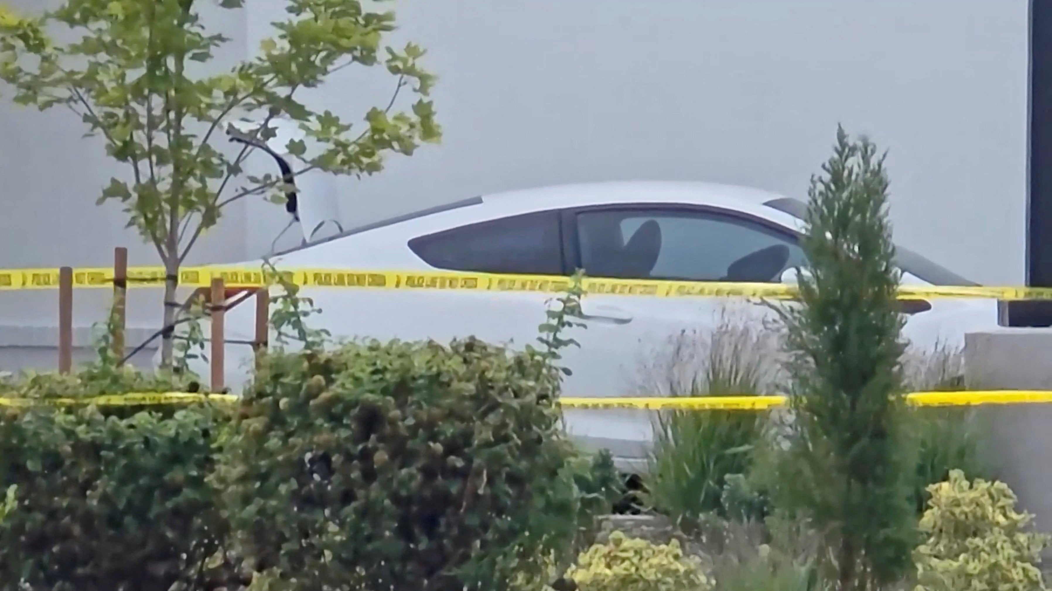 A vehicle is cordoned off at the site of a fatal shooting in Twin Falls, Idaho, on Saturday. Photo: ABC/Reuters