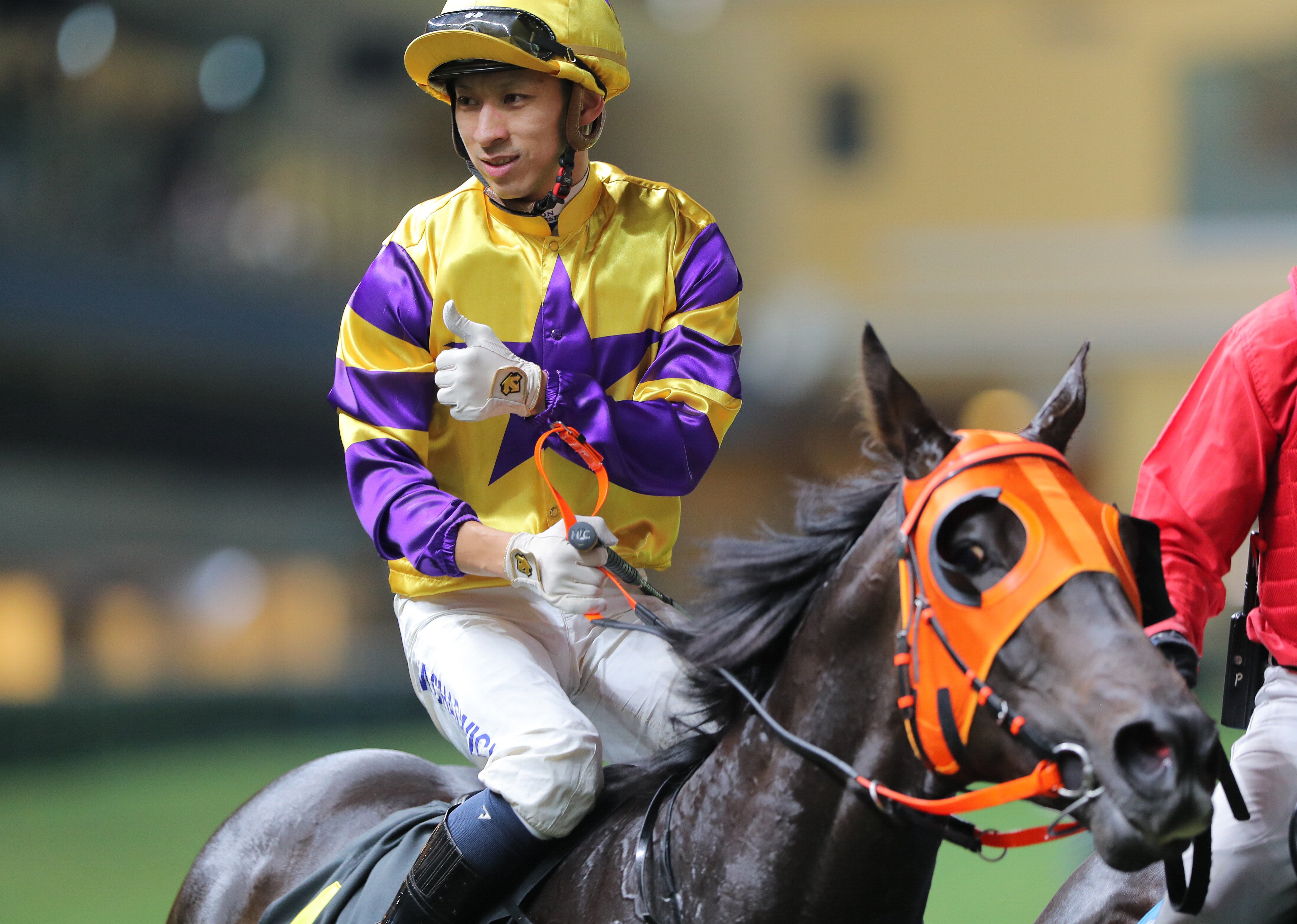Matthew Chadwick celebrates his victory on Another Zonda at Happy Valley. Photo: Kenneth Chan.