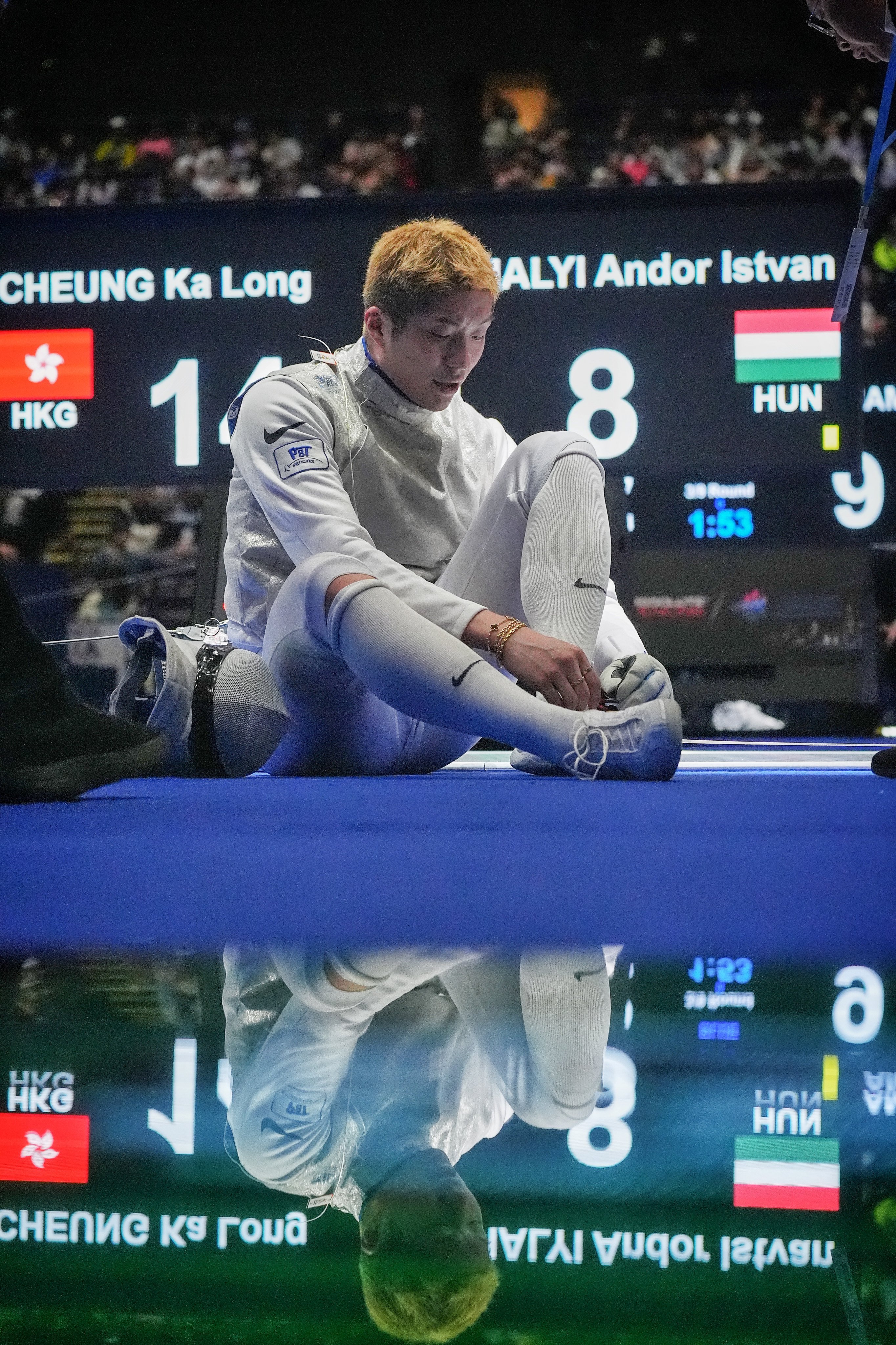 Hong Kong’s Cheung Ka-long takes a moment during a men’s team foil contest against Hungary at the Kerry Fencing World Championships. Photo: Elson Li