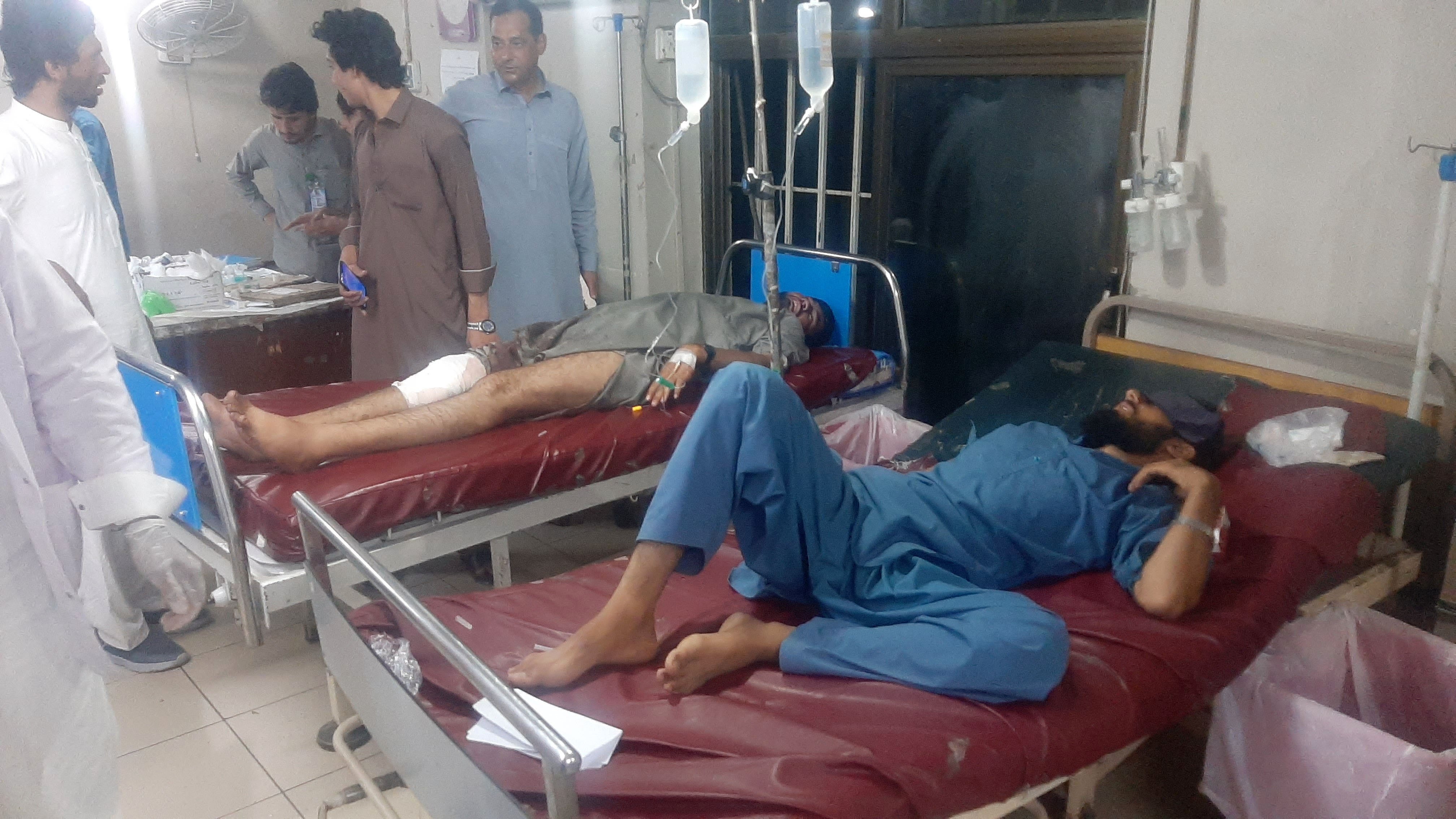 Injured victims receive medical treatment at a hospital after a suicide bombing in Mingora, Pakistan, on Sunday. Photo: EPA
