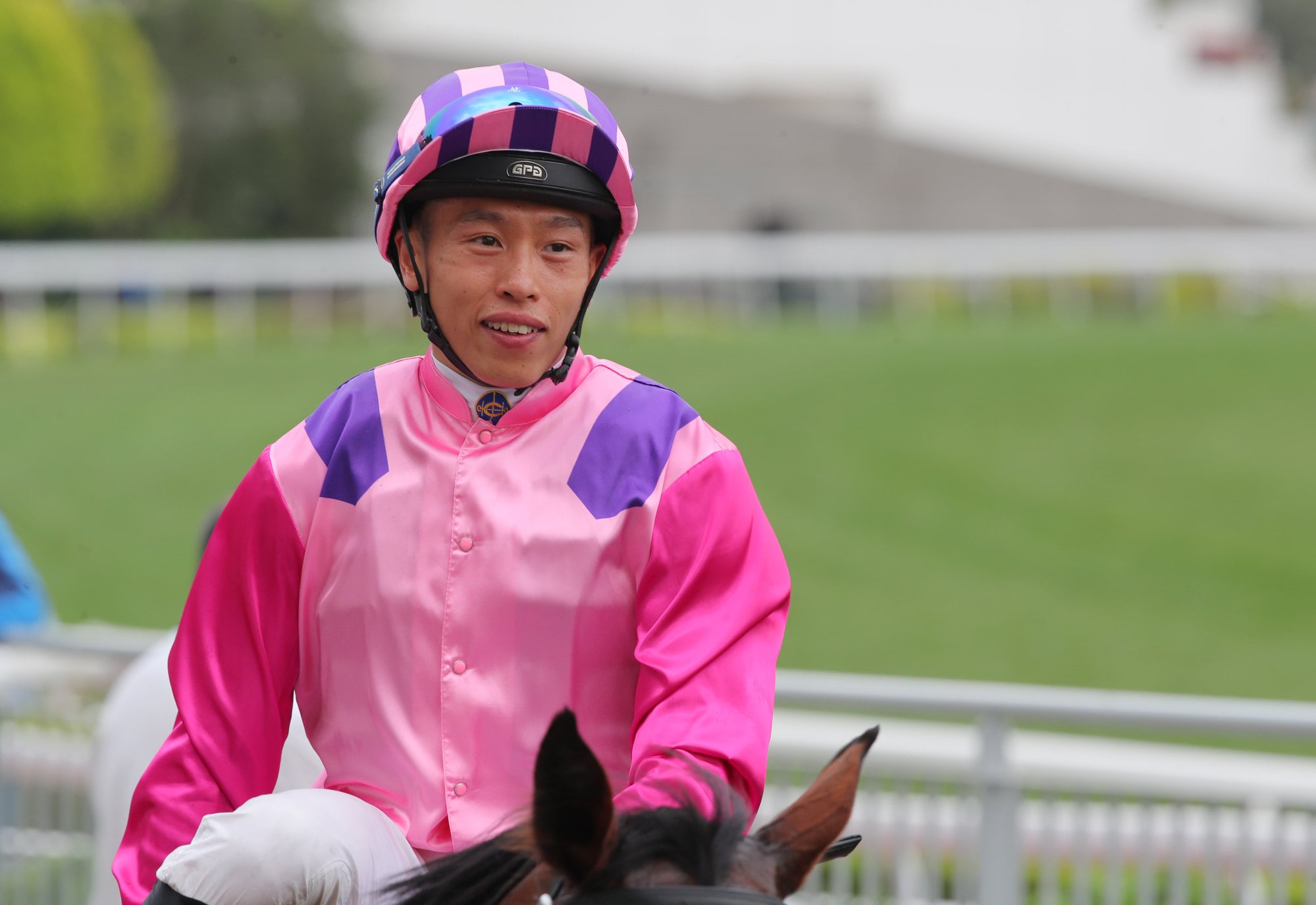 Vincent Ho returns after winning aboard Amazing Partners at Sha Tin. Photo: Kenneth Chan