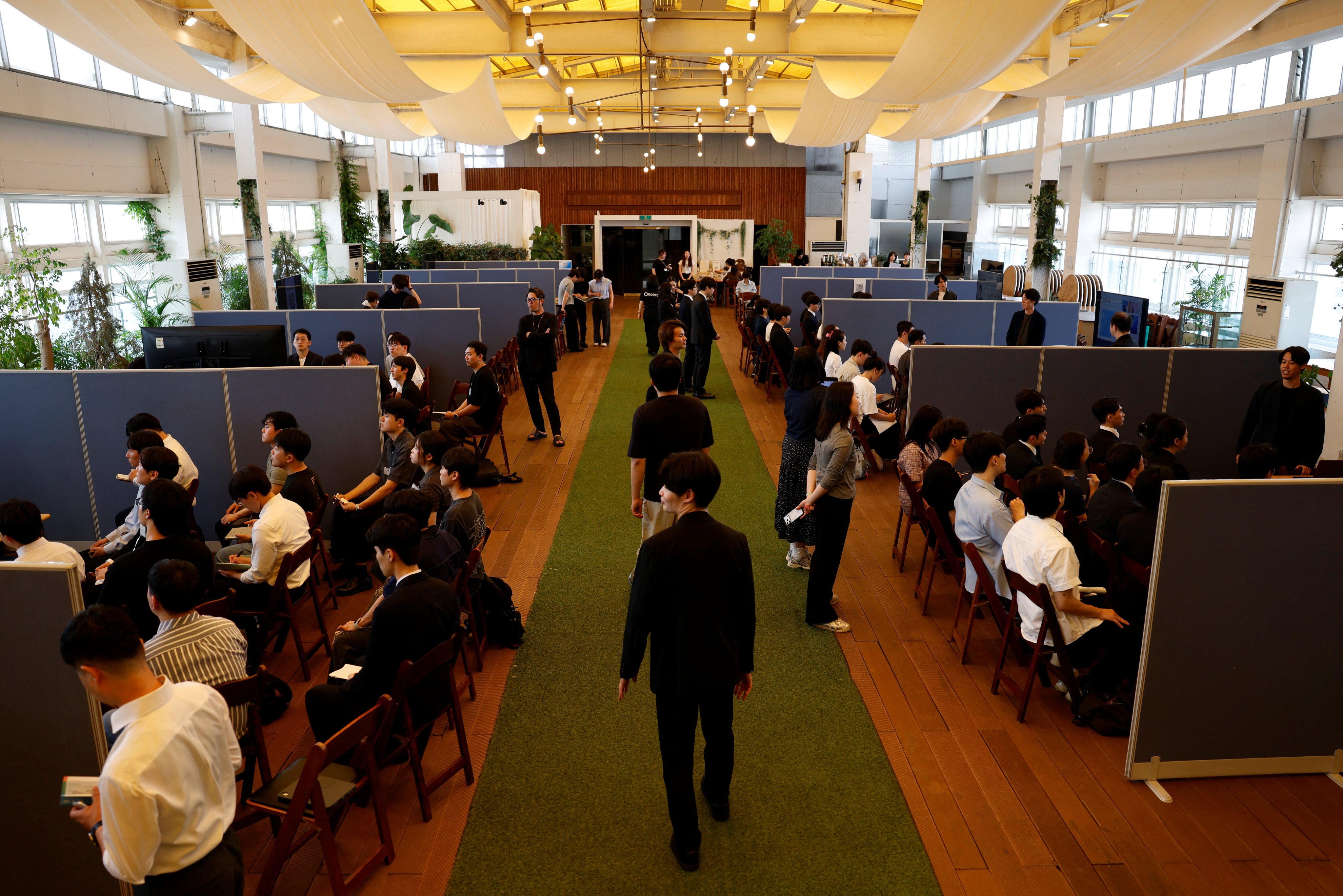 Young South Koreans attend a job fair connecting them with Japanese employers in Seoul on July 12. Photo: Reuters