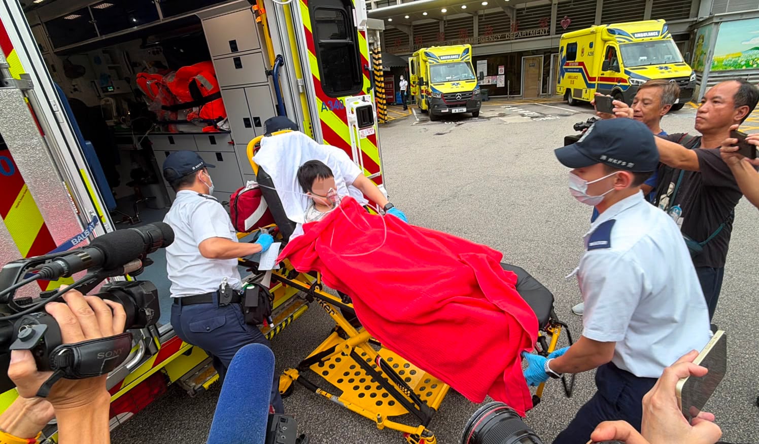Emergency services rushed the children to Queen Elizabeth Hospital for treatment. Photo: Handout