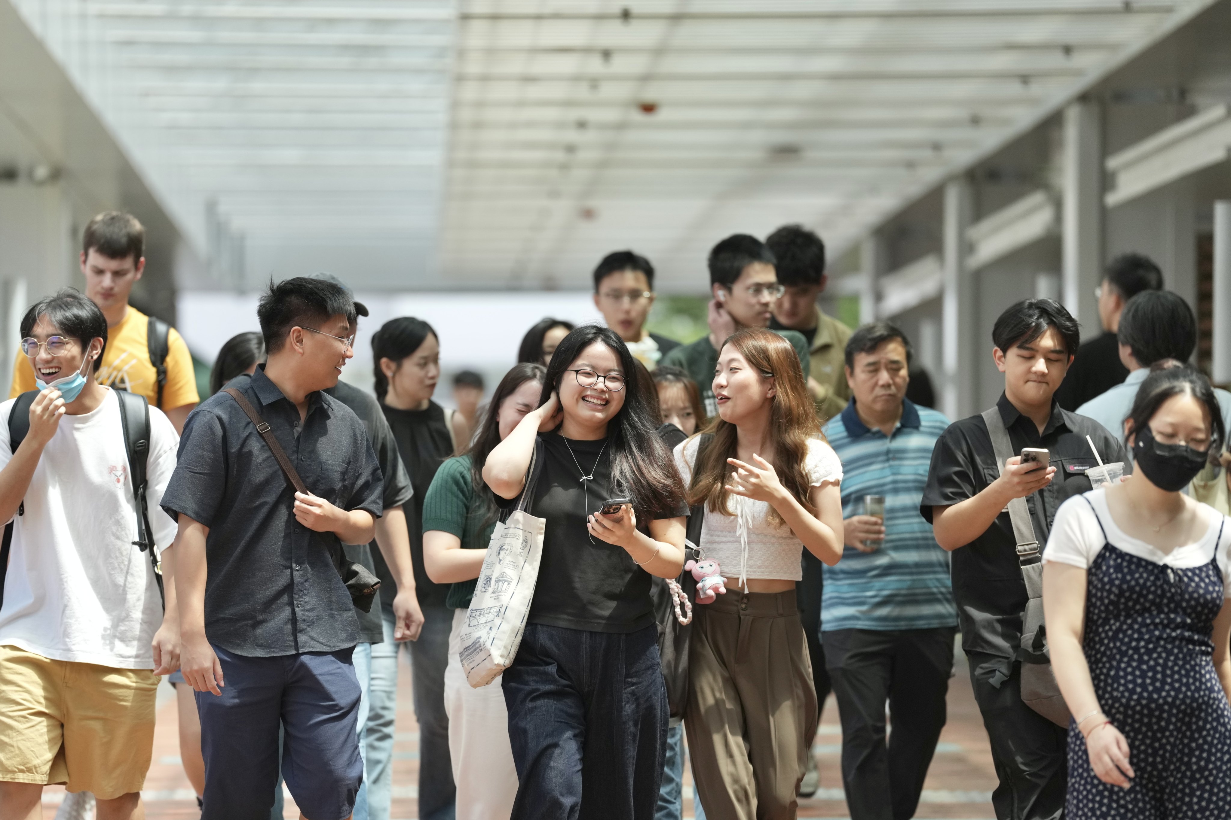 Students inside the University of Hong Kong campus in Pok Fu Lam. The institution handed out 12 offers through its medicine, government and law, business administration and law programmes. Photo: Karma Lo