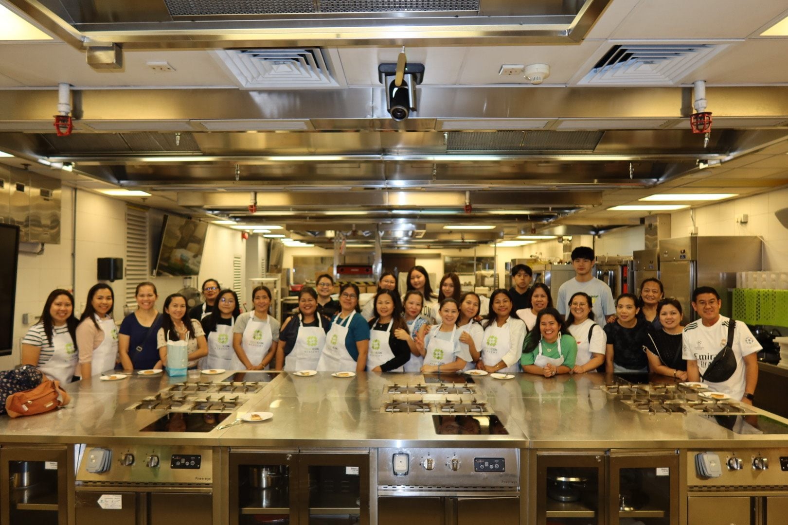 4HOME, a student-led group that invites the city’s domestic workers to share recipes and stories, hosts a Vietnamese cooking workshop at Hotel ICON. Photo: Handout