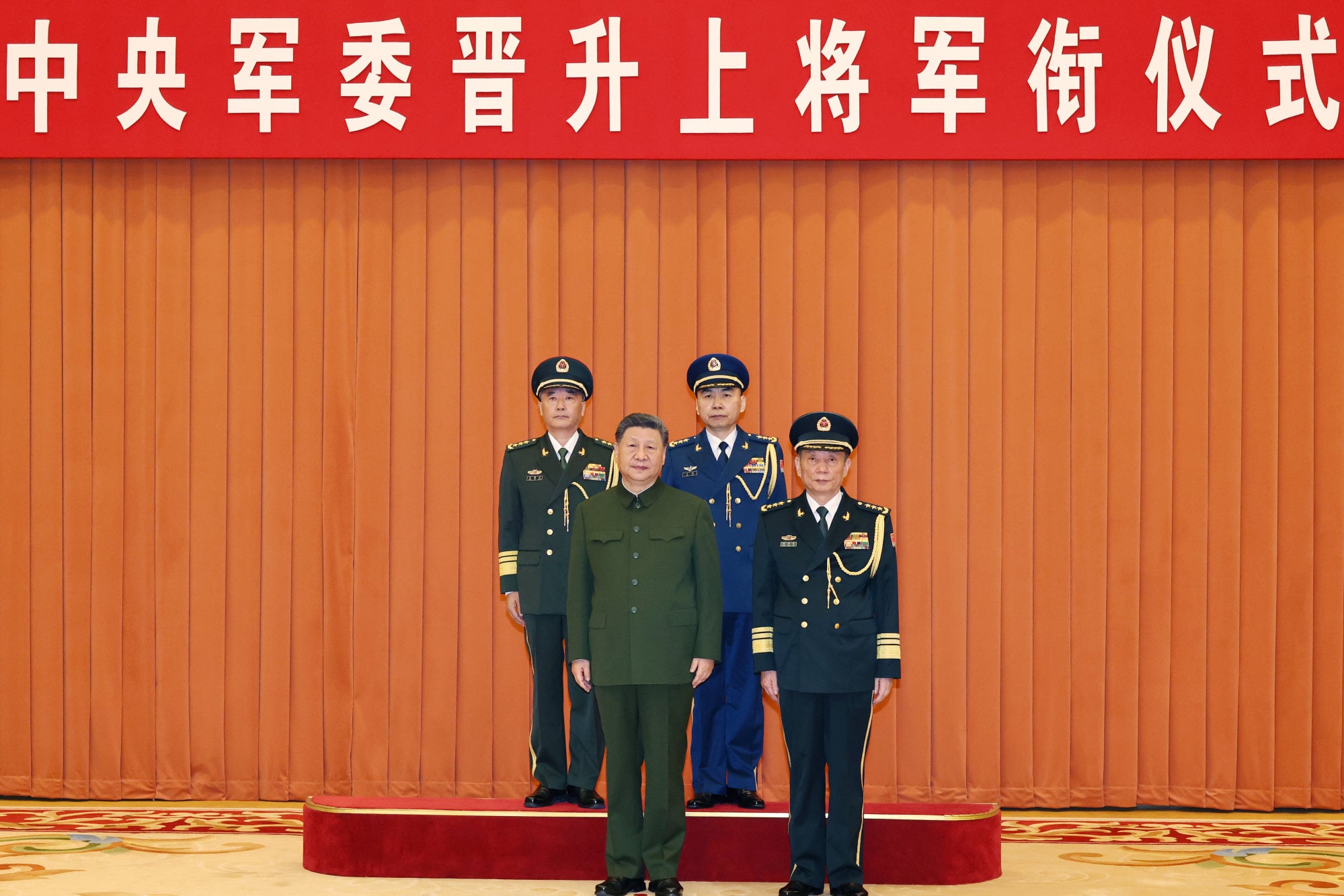 President Xi Jinping, chairman of the Central Military Commission, poses with CMC vice-chairman Zhang Shengmin (front row), and the newly promoted Zhang Shuguang (back row, left) and Wang Gang, in Beijing on July 3. Photo: Xinhua