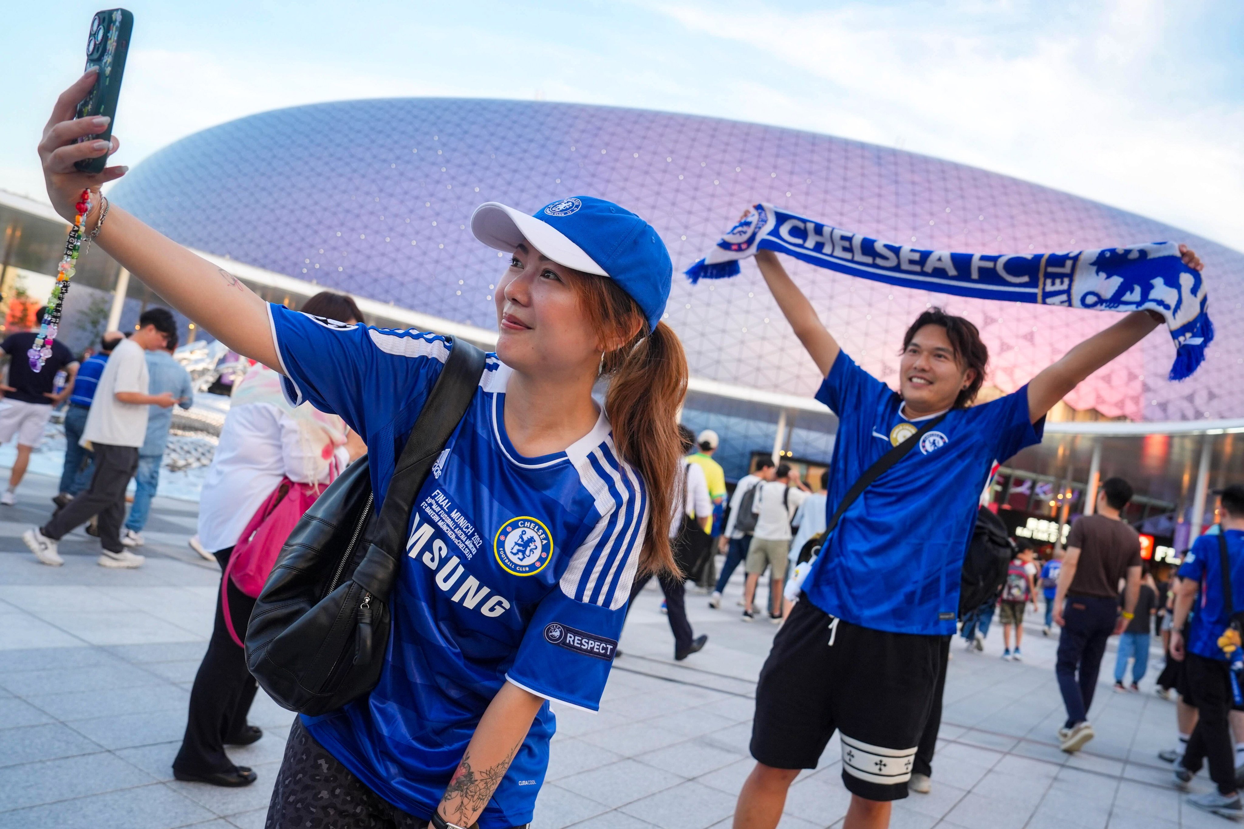 Chelsea fans gathered outside the stadium in the heat before the match against Juventus. Photo: Elson Li