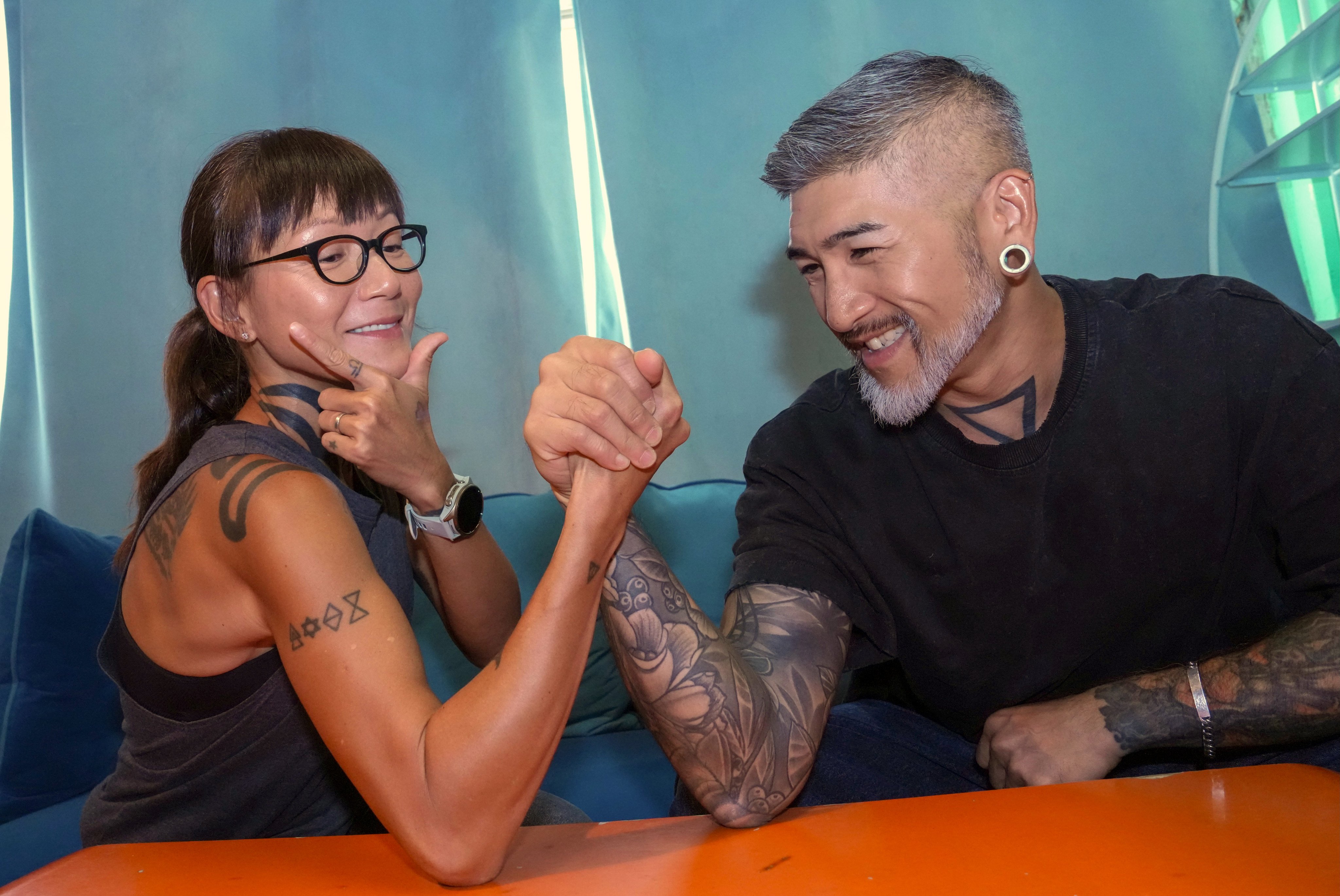 Interview with the Cantopop musicians (left) Candy Lo Hau-yam and Sammy So Ho-choy at So’s studio in Kwai Fong. Hong Kong celebs turned avid runners, ageing healthily story. 17JUL26. SCMP / Jelly Tse