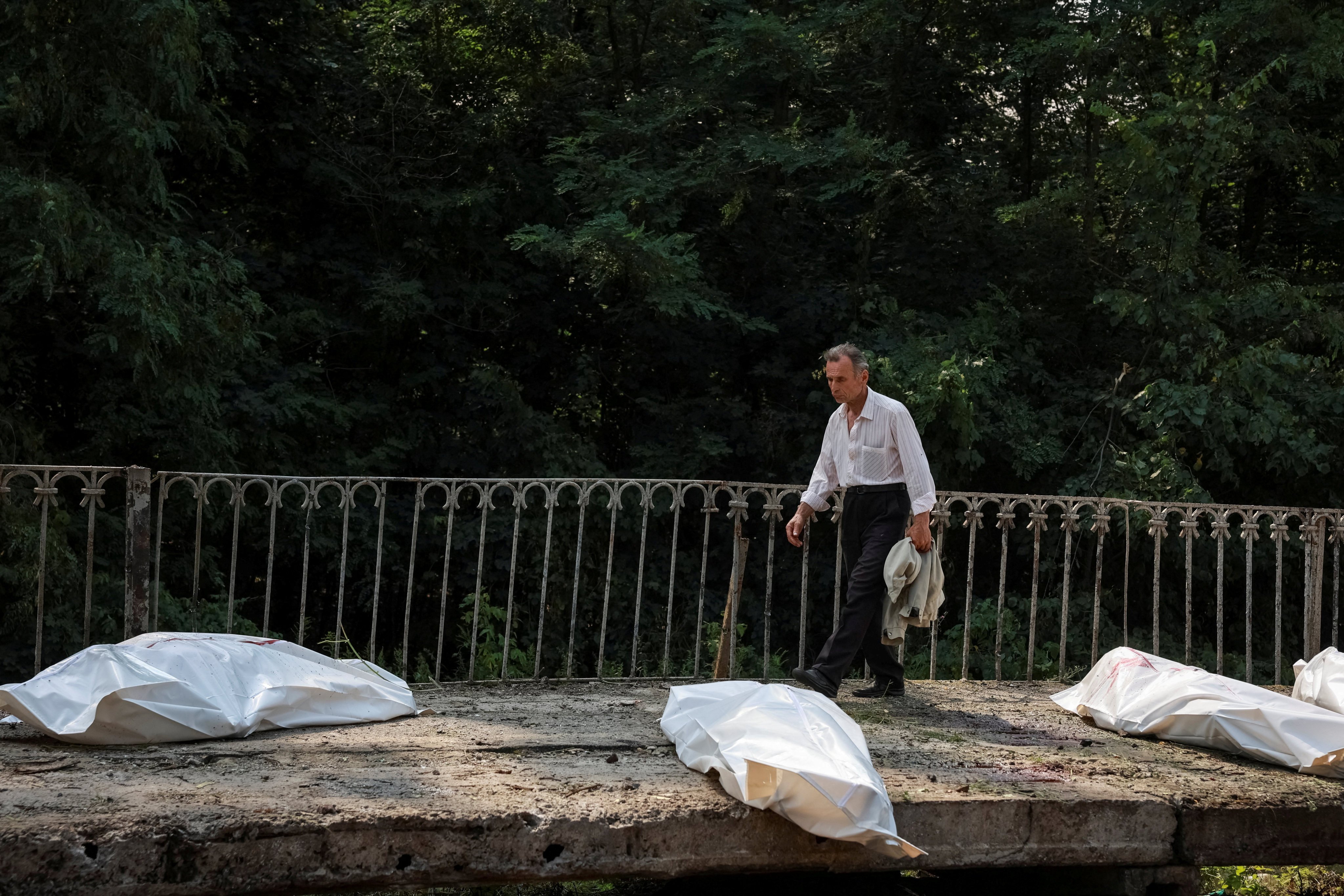 Dead bodies in body bags at a railway station in the Kyiv region. Photo: Reuters