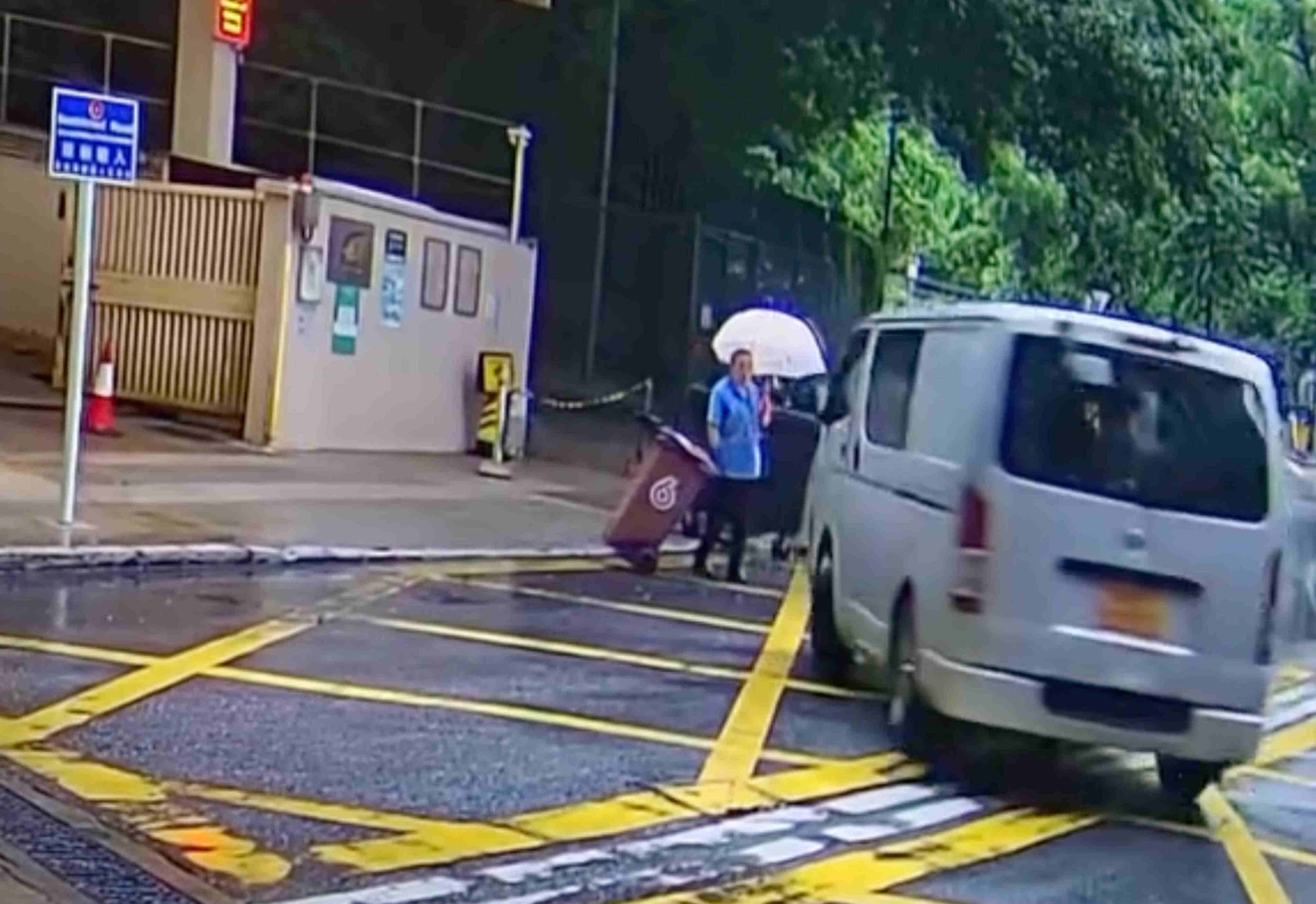 A 37-year-old van driver has been arrested after a viral video showed him swerving dangerously close to a woman on the side of the road in Wong Tai Sin. Photo: Handout