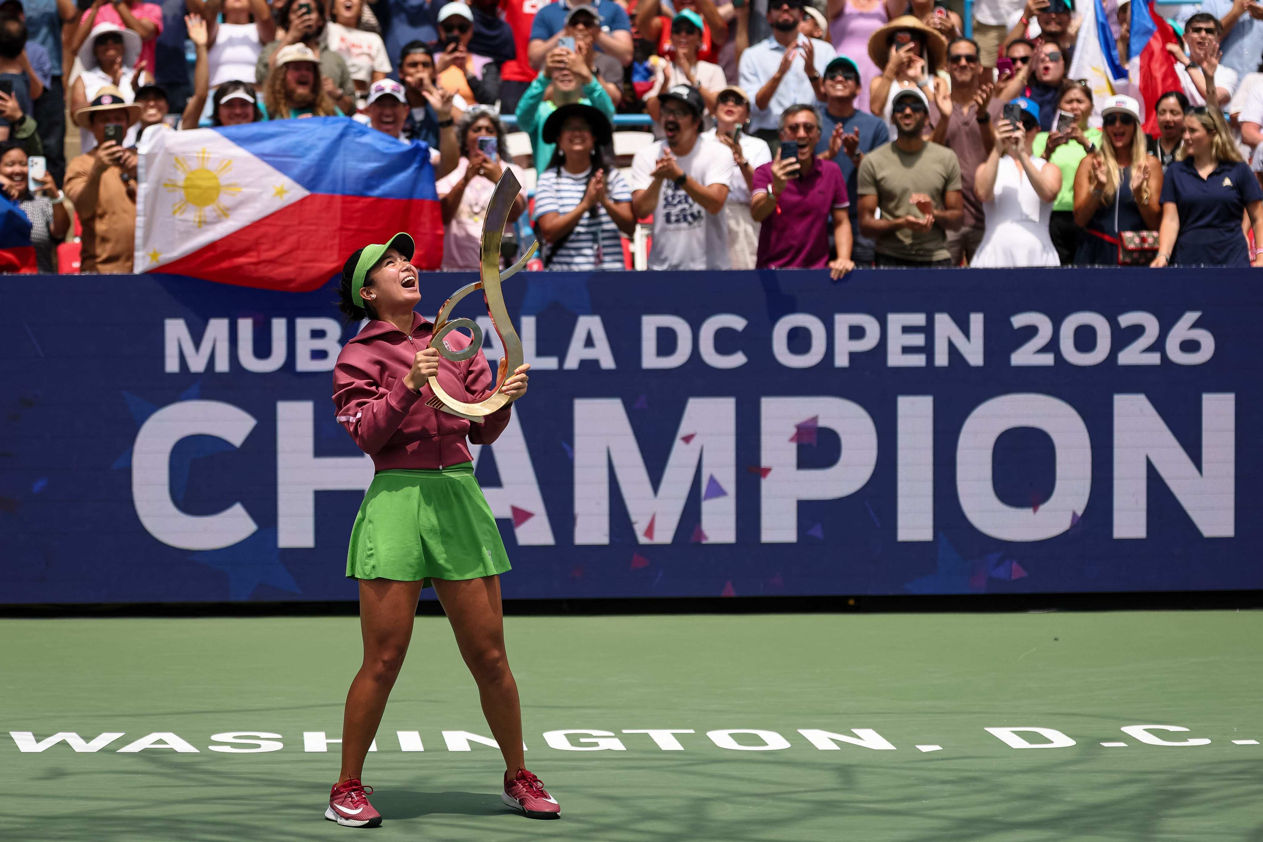 Alexandra Eala of the Philippines holds the championship trophy after winning the women’s singles final against Jessica Pegula of the United States at the Mubadala DC Open at the William H.G. FitzGerald Tennis Centre in Washington on August 3. Photo: AFP