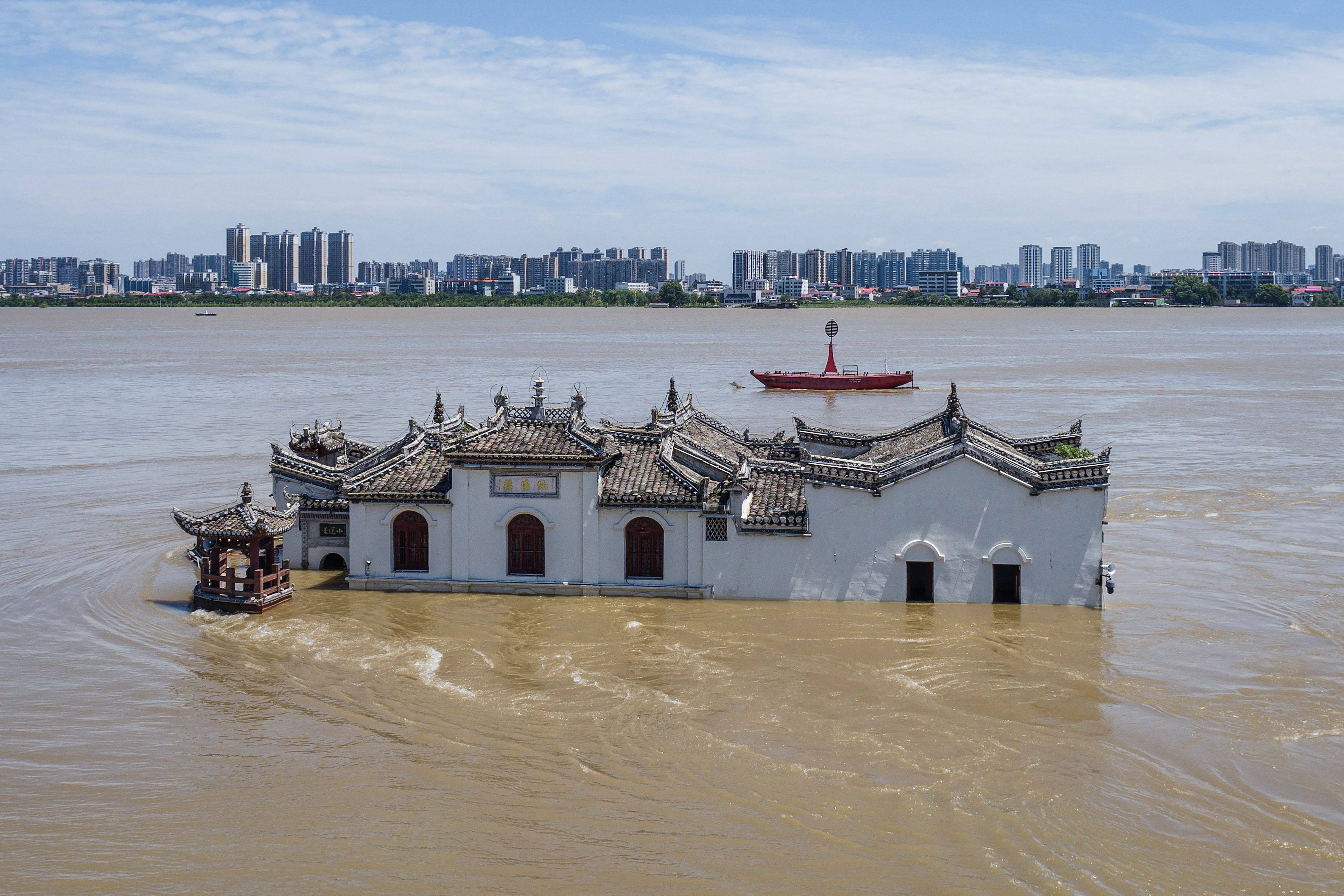 An aerial view of a partially submerged temple in in Ezhou, Hebei after the Yangtze River flooded. Photo: AFP/China OUT