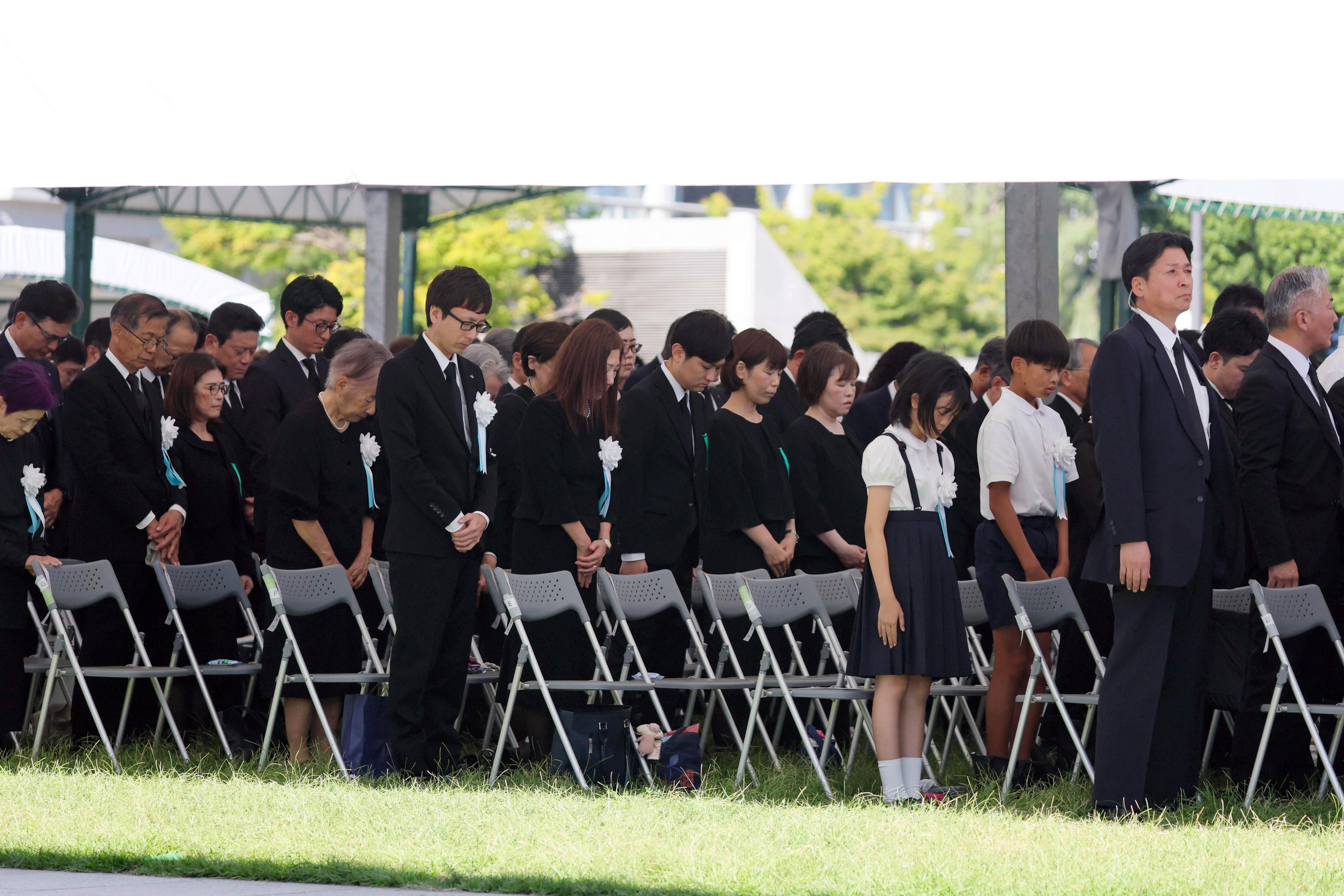 Attendees observe a moment of silence during the Peace Memorial Ceremony for the 81st anniversary of the atomic bombing of Hiroshima at Peace Memorial Park in Hiroshima. Photo: EPA/JIJI Press