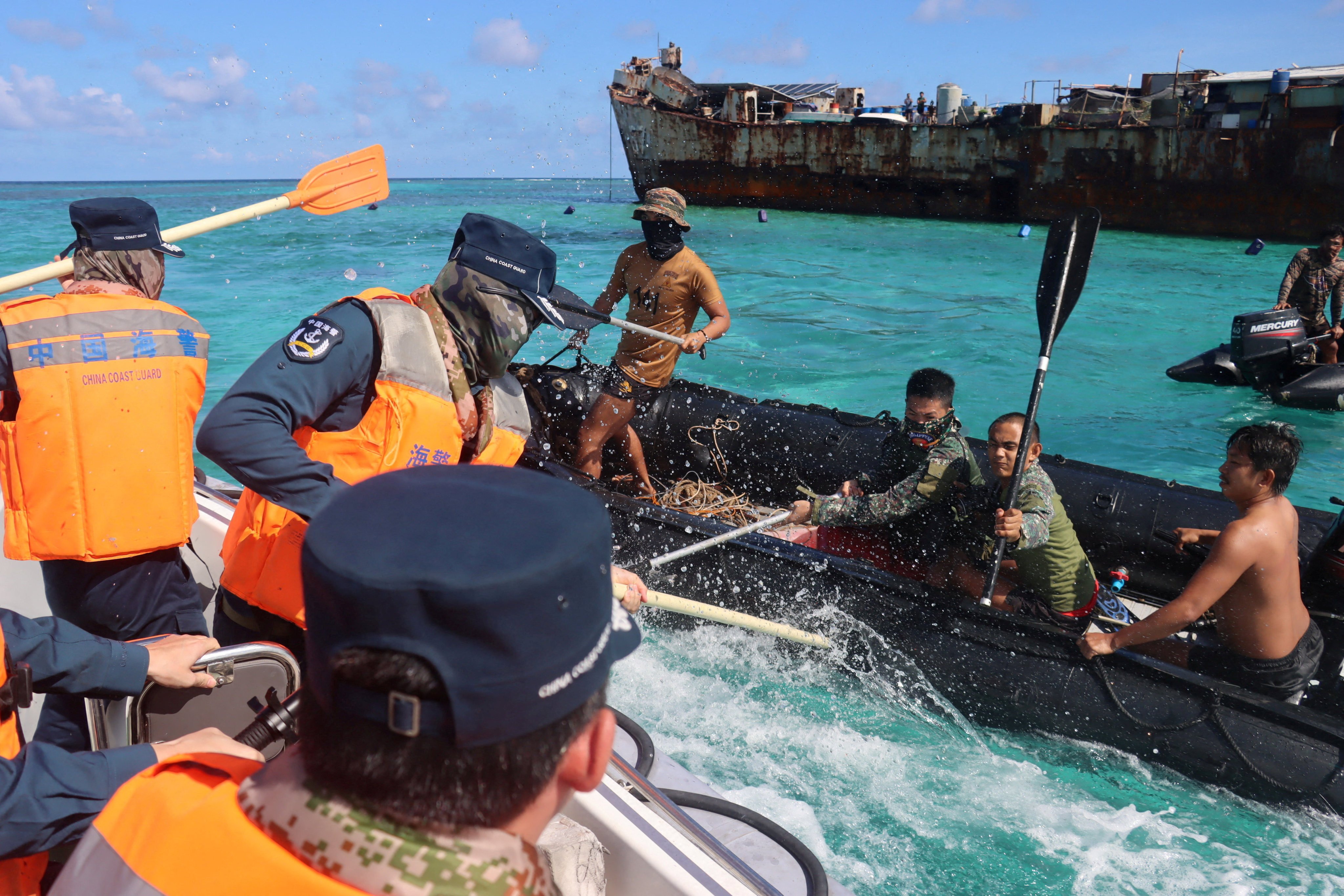 Personnel from the Philippine Navy and China Coast Guard clash near the grounded Sierra Madre at the Second Thomas Shoal in the South China Sea, on July 20. Photo: cnsphoto/Reuters