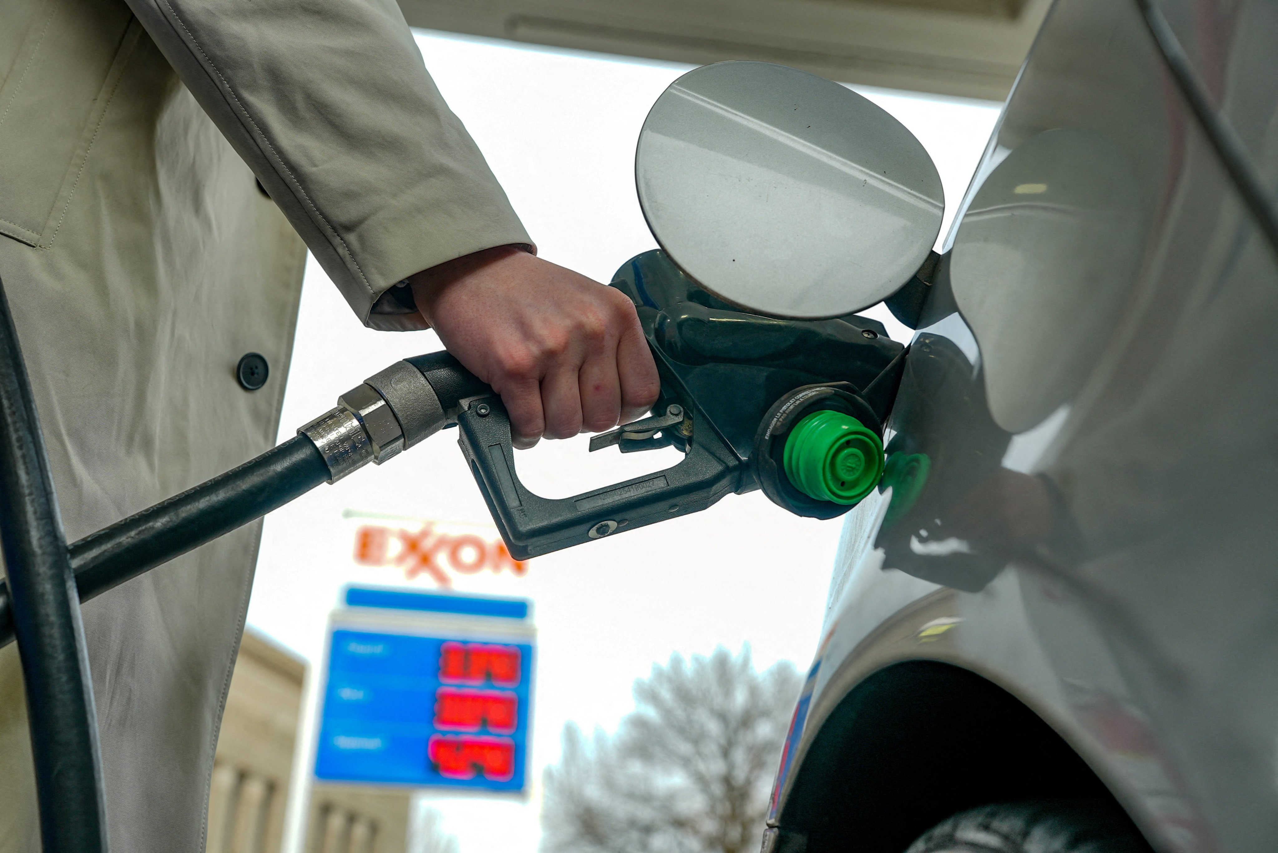 A man pumps petrol at an Exxon station in Washington on March 5. The price of oil has surged amid the US-Israeli conflict with Iran. Photo: Reuters