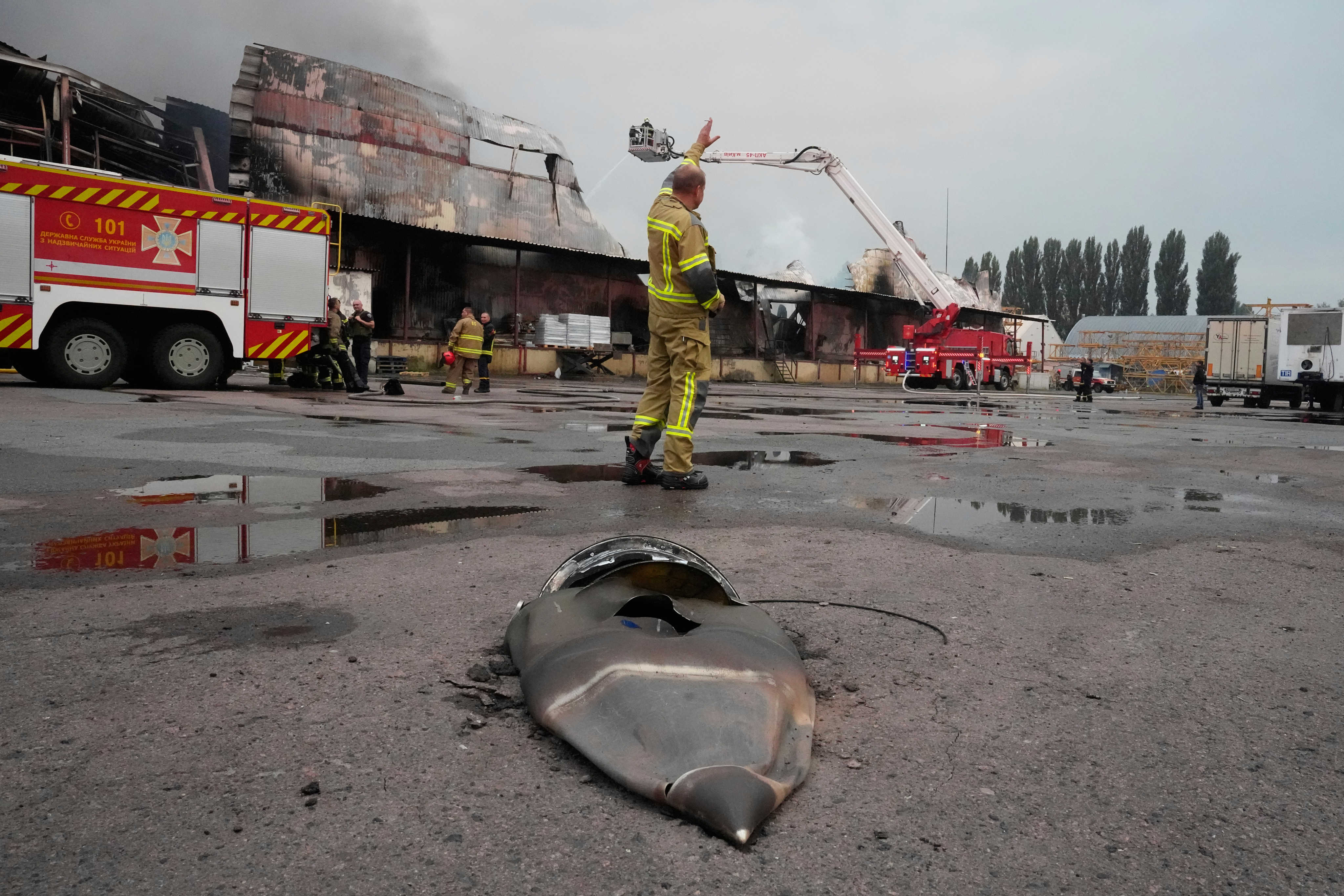 A fragment of a Russian missile at a food warehouse near Kyiv. Photo: AP