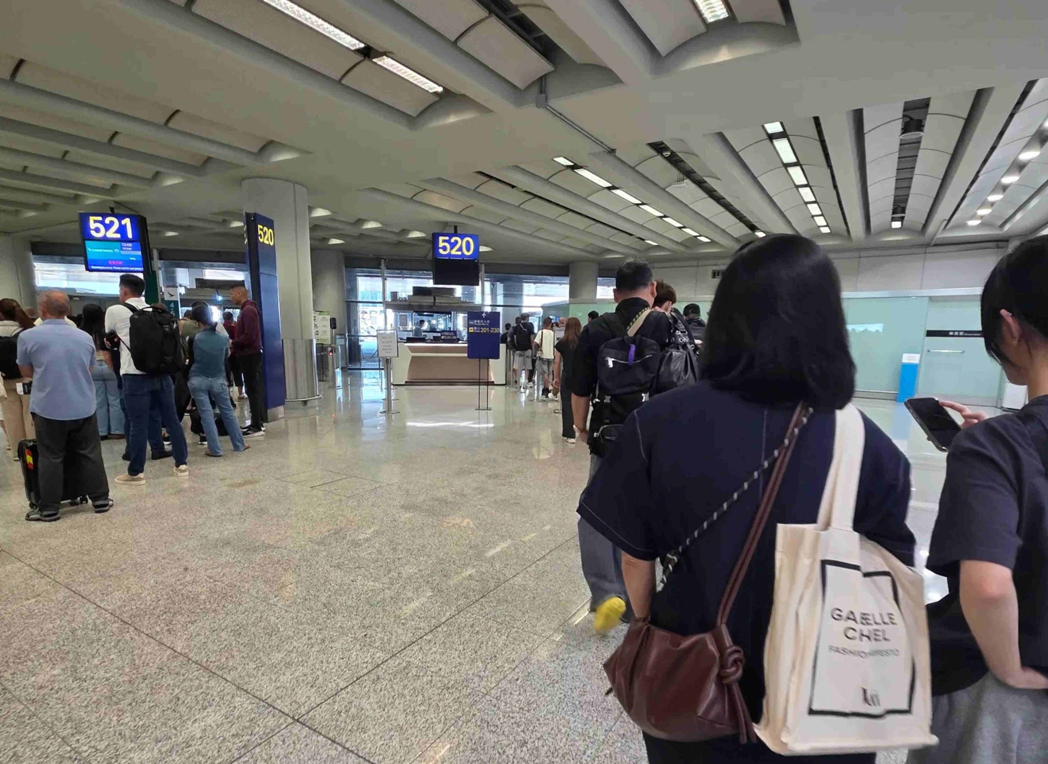 Scores of travellers at Hong Kong International Airport were forced to take alternative routes to their boarding gates after an automated train serving Terminal 2 broke down. Photo: Handout