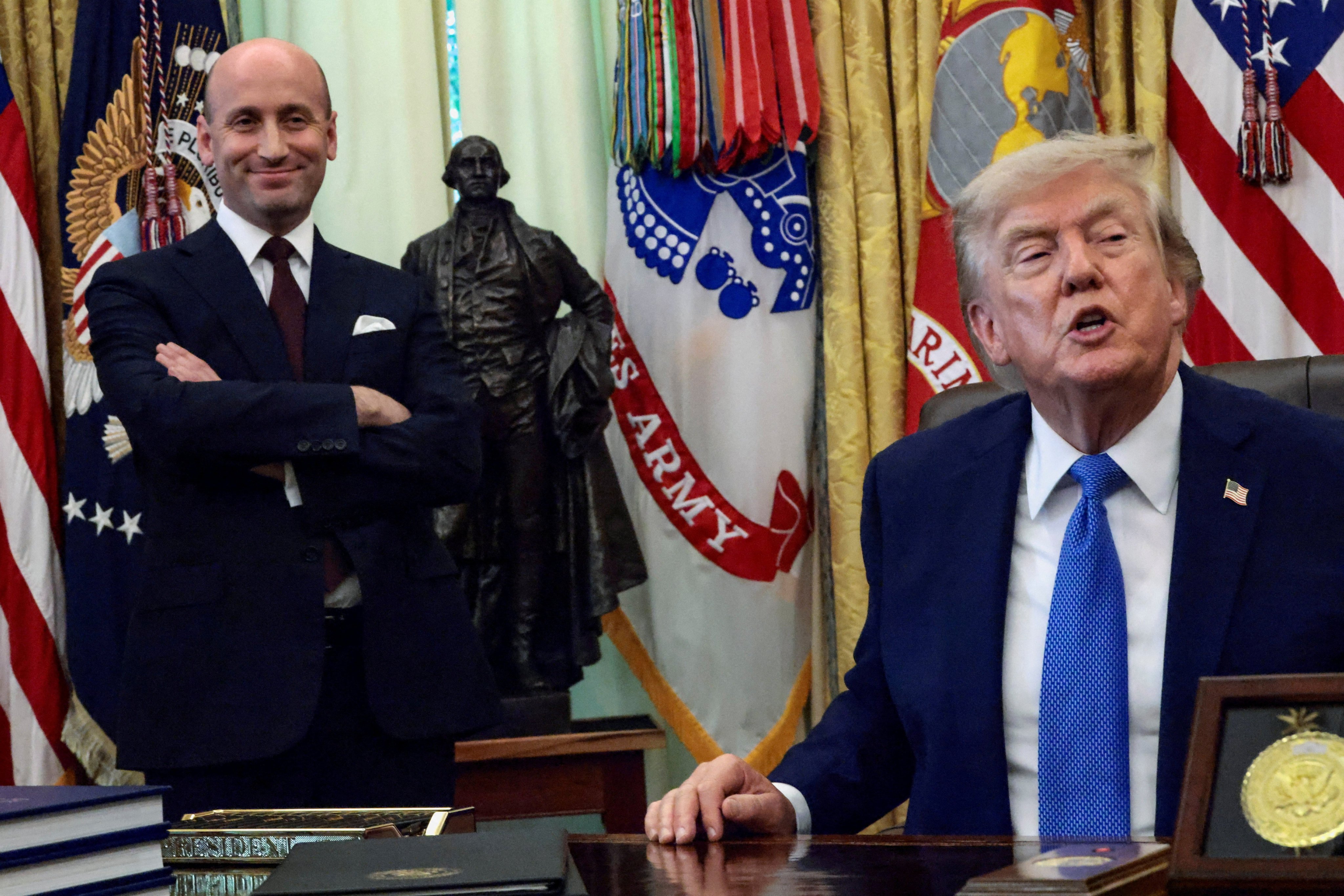 US President Donald Trump and White House deputy chief of staff Stephen Miller on Thursday. Photo: Reuters