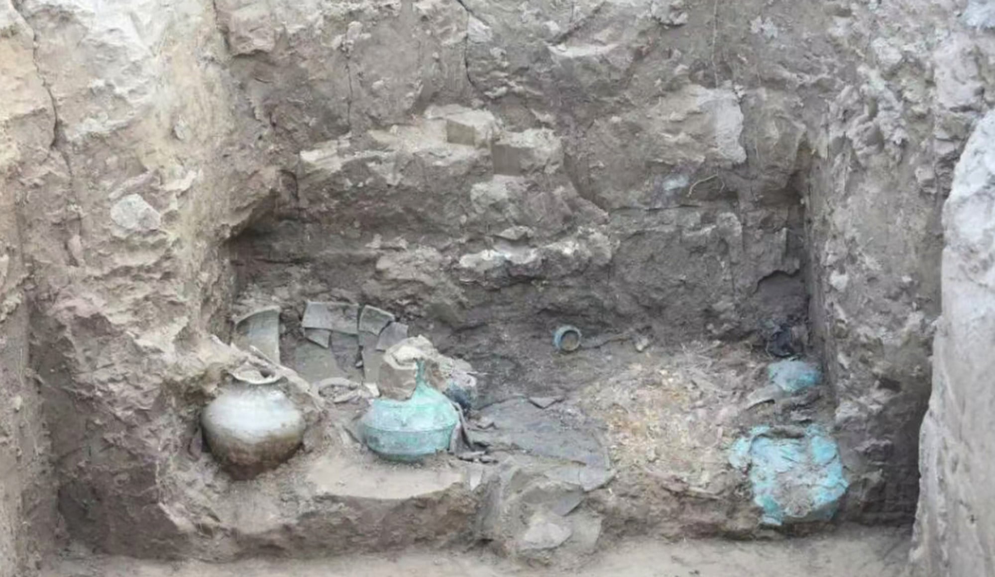 The wine vessel pictured at the cemetery after archaeologists found it. Photo: Handout The wine vessel pictured at the cemetery after archaeologists found it. Photo: Handout