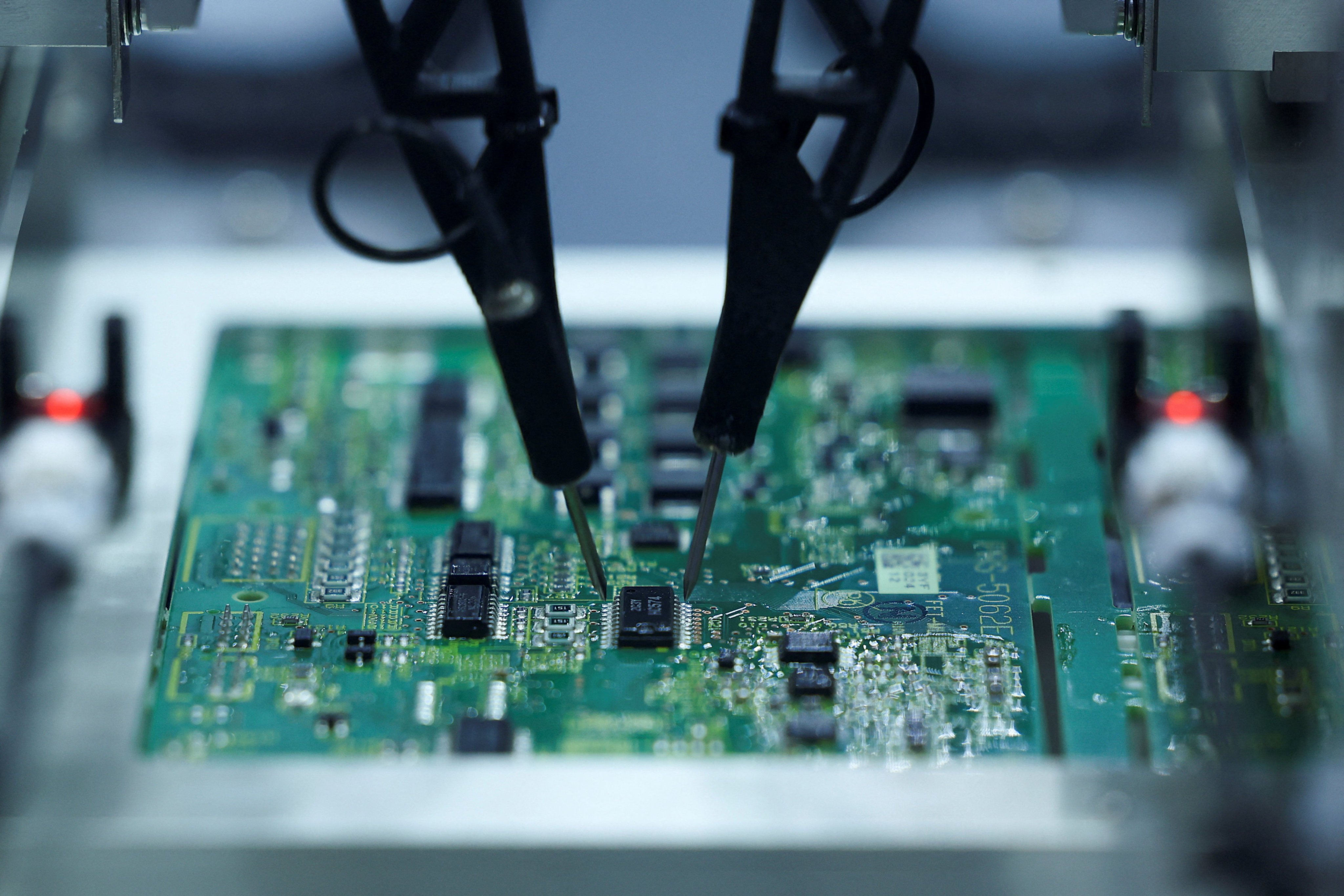 Robots assemble chips during Semicon Southeast Asia 2026 in Kuala Lumpur on May 5. Photo: Reuters